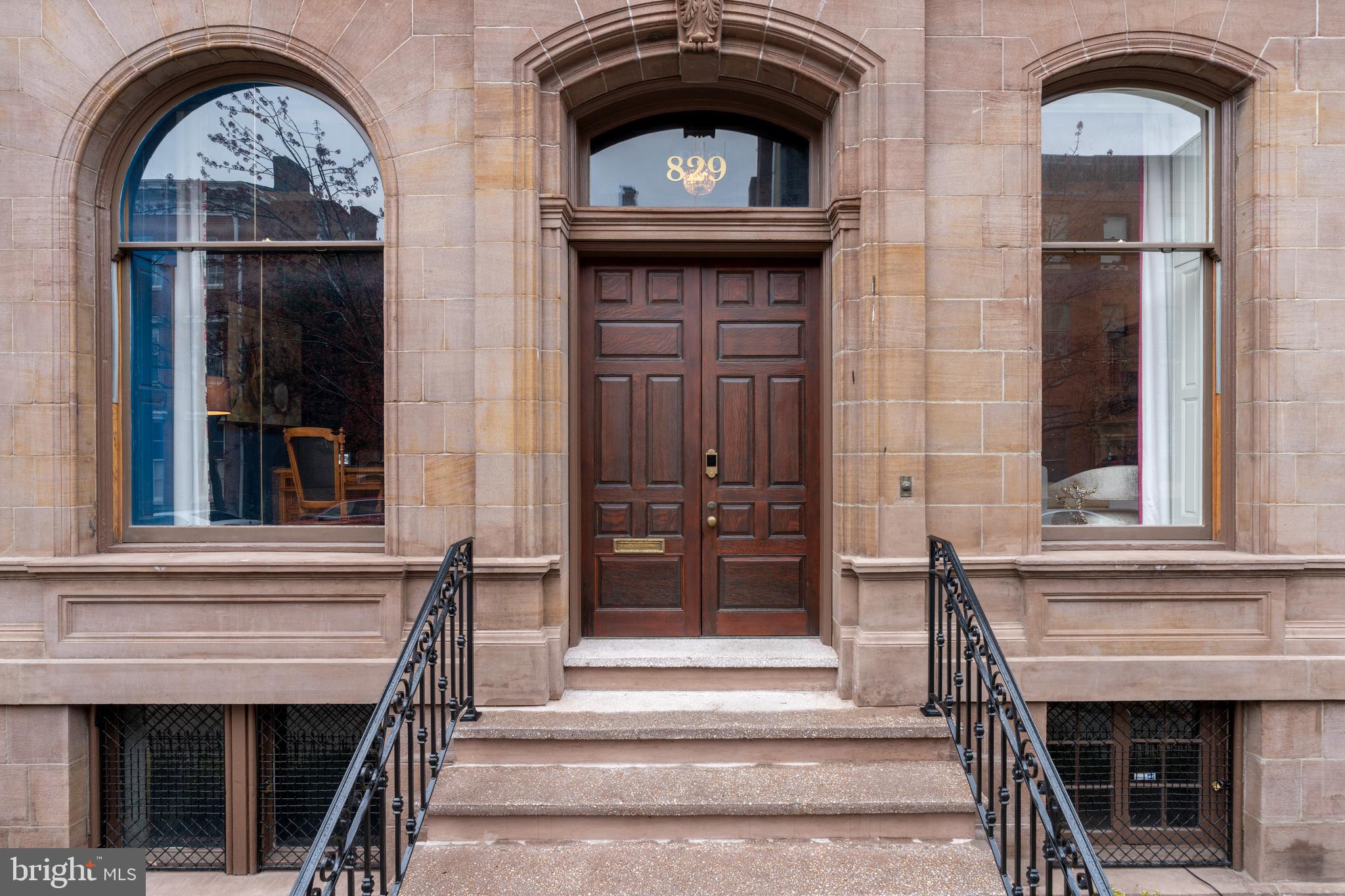 Historic Mansion in Mount Vernon, Baltimore: A Gilded Age Masterpiece

Nestled in the heart of Baltimore’s esteemed Mount Vernon neighborhood, this meticulously restored 6,900+ sq. ft. brownstone offers a rare blend of historic grandeur and modern luxury. Originally constructed in the 1880s, the residence was home at the turn of the century to the Knabe family, renowned piano makers who expanded the house in a way that reflected their social standing and suited their penchant for throwing parties that regularly made the society pages.  This spectacular home boasts six bedrooms with three full and two half bathrooms, ensuring ample space for family and guests, and an elevator for easy access to all floors.  A short walk to Penn Station, for easy and efficient commuting access to Washington, D.C., Philadelphia and New York.  Some of the home’s many features are:
 
Gourmet Kitchen: Designed for the culinary enthusiast, the kitchen is equipped with Thermador appliances (including 6-burner range and counter-depth refrigerator/freezer), matte quartzite countertops, mother-of-pearl backsplash and pale blue cabinetry, along with table space and a wet bar with wine fridge, dark cabinetry and a dazzling white quartzite countertop.
 
Great Room: The former conservatory is a breathtaking highlight, featuring 10 solid Italian marble columns, a milk-glass ceiling and intricately carved plaster and woodwork. Formal Living Room: With ornate plasterwork and a stunning chandelier, the large living room provides a sophisticated setting for entertaining.
 
Dining Room: The walls and coffered ceiling of the 500+ sq. ft. dining room are paneled in old-growth mahogany, lovingly restored. The room also features quarter sawn white oak parquet flooring with walnut and maple inlays and a grand fireplace.
 
Primary Suite:  The expansive primary bedroom on the second floor has a spa-like en-suite bathroom, featuring dual vanities, a freestanding Kohler BubbleMassageTM tub, and a spacious zero-entry shower with contemporary tilework; completing the suite is a large sitting room (or additional bedroom). Third Level: Four large bedrooms and two full baths (one en-suite). Additional Spaces:  Two beautiful, spacious offices, one on the first floor and one on the second (the latter also suitable for a nursery).  in the attic and the huge basement, which also houses a large workshop and a workout room.
 
Architectural Details: In addition to the gorgeous woodwork throughout, the home has a beautifully restored brownstone-and-brick façade. The interior retains a number of historic leaded glass windows, an ornate stained glass skylight above the staircase, and 11 fireplaces, many surrounded by original antique tiles.
 
Outdoor Amenities: Beneath the house is a garage for up to two cars. At the rear of the house is a walled courtyard with a garden that includes an espalier apple tree, a weeping cherry, and hydrangeas, and room for additional parking for four cars. A spacious deck off the great room, shaded by a majestic magnolia tree, is ideal for entertaining.
 
Modern Comforts: The home is equipped with multiple HVAC systems, providing year-round comfort on every floor and in every room, and there is a laundry room on the second floor.
 
 
For a more immersive experience and additional information, please visit Knabehouse on the web, where you can explore videos and learn more about this extraordinary property. This home offers a unique opportunity to own a piece of Baltimore’s fascinating history, updated with modern amenities for contemporary living.
