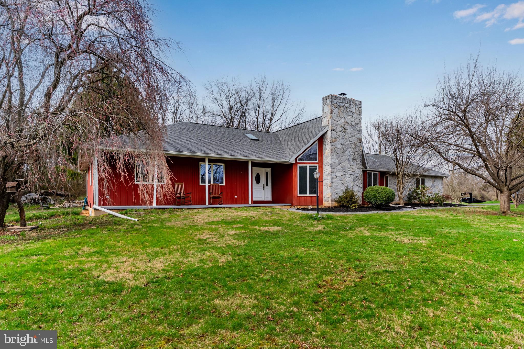 Searching for a private setting and larger lot? Here it is!!  A lovely 2,280 square foot sprawling ranch home on 3.91 acres in Big Spring School District near the Big Spring creek. Great location mid-way between Carlisle and Shippensburg -- only 15 mintues either way to local businesses and activities such as fishing, or biking and walking on the rail trail.  This home was thoughfully designed for views of outdoor nature from every room. The living room features hardwood flooring, cathedral ceilings, and a stone floor-to-ceiling wood-burning fireplace flanked by windows that stream warm natural light and provide a peaceful view. The hardwood flooring flows into the nice size office with built-ins, and on into the dining room that's adorned with an expansive bay window and a door leading to the brand new rear deck.  You can view the beautiful backyard from the sink in the spacious kitchen which offers an abundance of cabinetry, double wall ovens, cooktop, ceramic tile floors, built-in desk area and china display cabinet, as well as a breakfast nook with french doors also leading to the deck! The primary bedroom has dual closets, a private door to it's own rear deck, and a private primary bath with double vanity, shower and a jetted tub.  You'll find two additional bedrooms, a second full bath, the laundry room/mud room, and a half bath that complete the main level of the home. The partially finished walk-out basement provides a third full bath, a room that the current owner is using as a 4th bedroom, a large recreation area, and tons of storage space.  Parking is not a problem with the attached 2-car garage and generous paved driveway.  Storage shed for all your lawn care tools., and there's even a rock-lined koi pond ready if you desire to reactivate it.   Call your agent to schedule a showing today!!  NOTE: Floor plan measurements are approximate. Buyers and agents should verify.