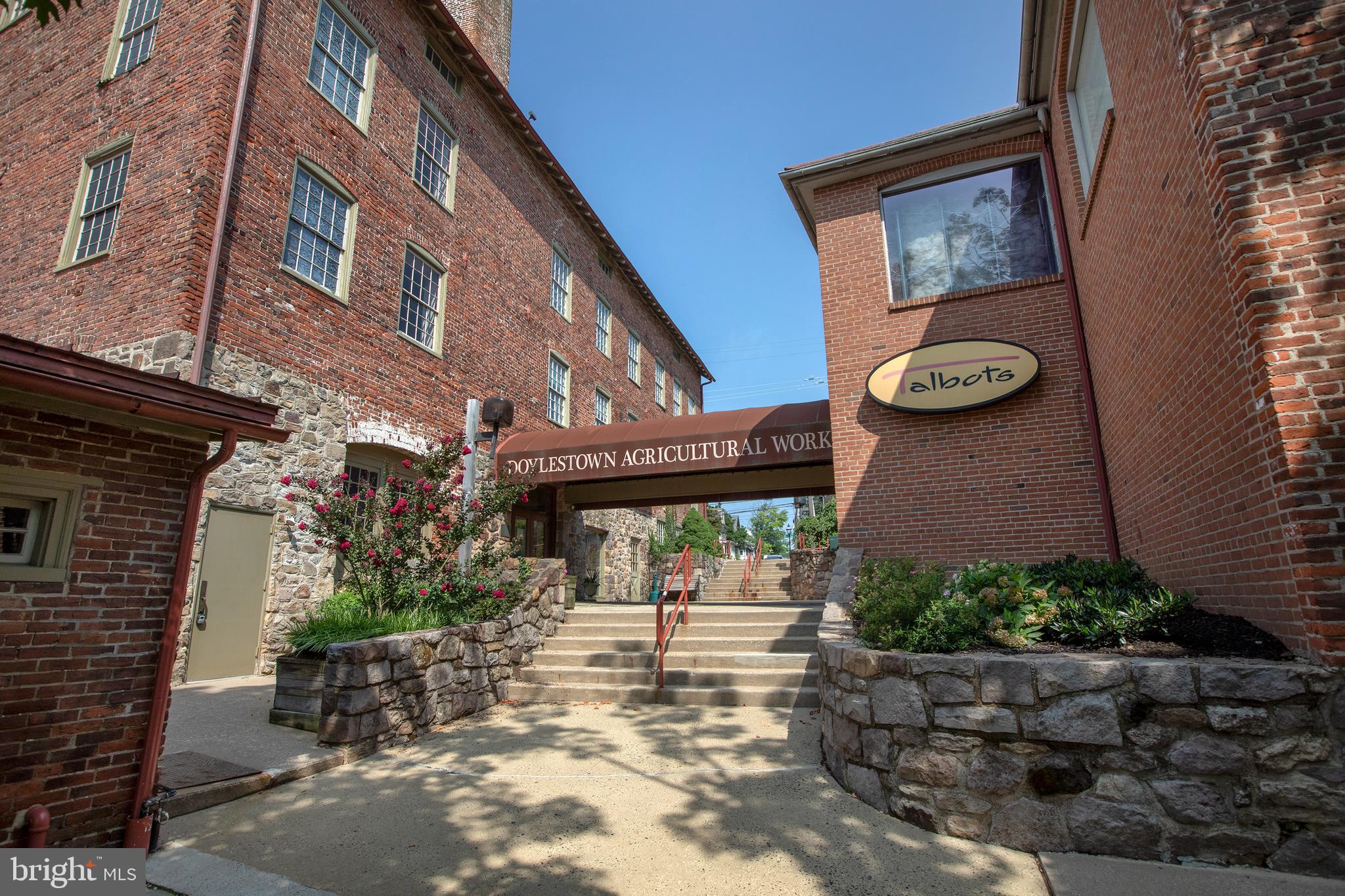 The Doylestown Agricultural Complex: a 19th century mixed brick and timber framed building redeveloped in the late 20th Century into a mixed use, multi-structure property.  Anchored by longtime retail tenant (Talbot's), and a large PNC Bank office branch, and Slate Bleu restaurant, the complex offers over 35,000 SF of rentable square footage, multiple parking lots (over 100 spaces in total), and is located adjacent to the SEPTA R-5 line train station.  Walkable to the Bucks County Courthouse and Justice Center, and the downtown shopping and dining areas of historic Doylestown Borough.