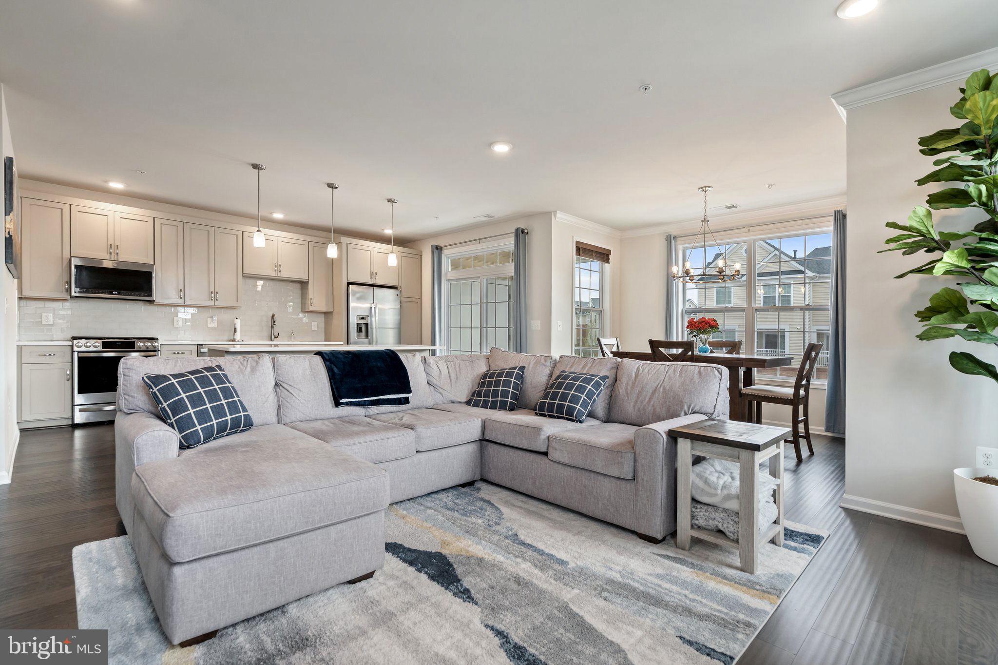 GORGEOUS END UNIT TOWNHOME STYLE CONDO IN SOUGHT-AFTER LOUDOUN VALLEY ESTATES. 2 BEDROOMS, 2.5 BATHROOMS WITH A ONE CAR GARAGE AND GROUND FLOOR ENTRY. OPEN FLOOR PLAN WITH PLENTY OF NATURAL LIGHT. THIS HOME FEATURES A GOURMET KITCHEN, STAINLESS STEEL APPLIANCES, QUARTZ COUNTERTOPS, SUBWAY TILE BACKSPLASH, AND GLEAMING HARDWOOD FLOORS THROUGHOUT THE OPEN-CONCEPT MAIN LEVEL. THE SPACIOUS MASTER BEDROOM FEATURES A WALK-IN CLOSET AND PRIVATE BATH WITH DOUBLE VANITY. WELL WELL-SIZED SECONDARY BEDROOM ALSO HAS A WALK-IN CLOSET AND A PRIVATE BATHROOM. THE COMMUNITY OFFERS FITNESS CENTER, TENNIS COURTS, POOLS, TOT LOTS, WALKING PATHS AND MORE. EASY ACCESS TO  LOUDOUN COUNTY PARKWAY, DULLES GREENWAY, DULLES AIRPORT AND ASHBURN METRO STATION.