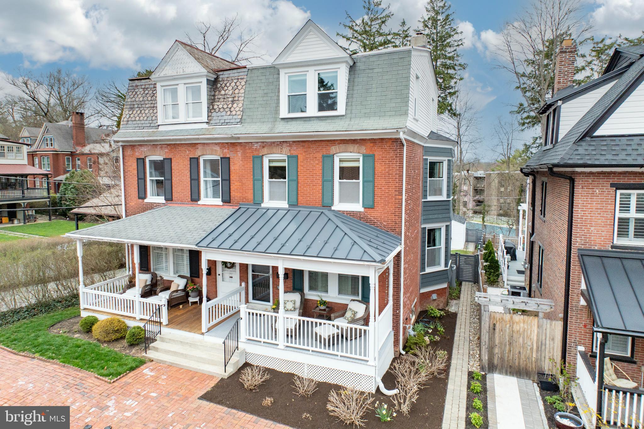 Stunning 3Sty Victorian Brick Twin in West Chester Boro!  Sleek Modern Finishes with all the Rich Architectural Character remaining!! Front Porch, 9ft Ceilings, Gleaming Cherry Hardwoods, Extensive Custom Millwork & Cabinetry, Front & Back Stairs, Pocket Doors and more… ½ block to Marshall Square Park!  2380Sqft  4Bedrooms  3Baths  .08acres  2CAR Detached Garage   Main Level: Double Door Vestibule Entry, Elegant Foyer Hall,  Living Room: Arched Doorways, Wonderful Window Seat & Built-ins, Dining Room w/Box Bay Window, THE Kitchen: LARGE Island, Quartz & Stainless, Edgy Glass Range Hood,  Cool French Door Slide Wall opens to the Fabulous Family Room: Stone GAS Fireplace, Built-in Desk, Mud Room/Back Foyer Entry to the Deck, Full Bath tucked in under the Spindled Staircase,  2nd flr: Owners Suite: Walk-in Closet, EnSuite Bath: all glass & tile, Laundry, Full Bath, Bedroom. 3rd flr: 2Bedrooms. Lower Level: 1060Sqft of Storage.  Skilled attention to every detail!  Fenced, Private Backyard: Expansive Hardscapes surrounded by Glorious Gardens.  The front porch is just waiting for your wicker furniture & a mint julep!  Come discover this Delightful FRESH yet Comfortable Home & Boro Life Style!