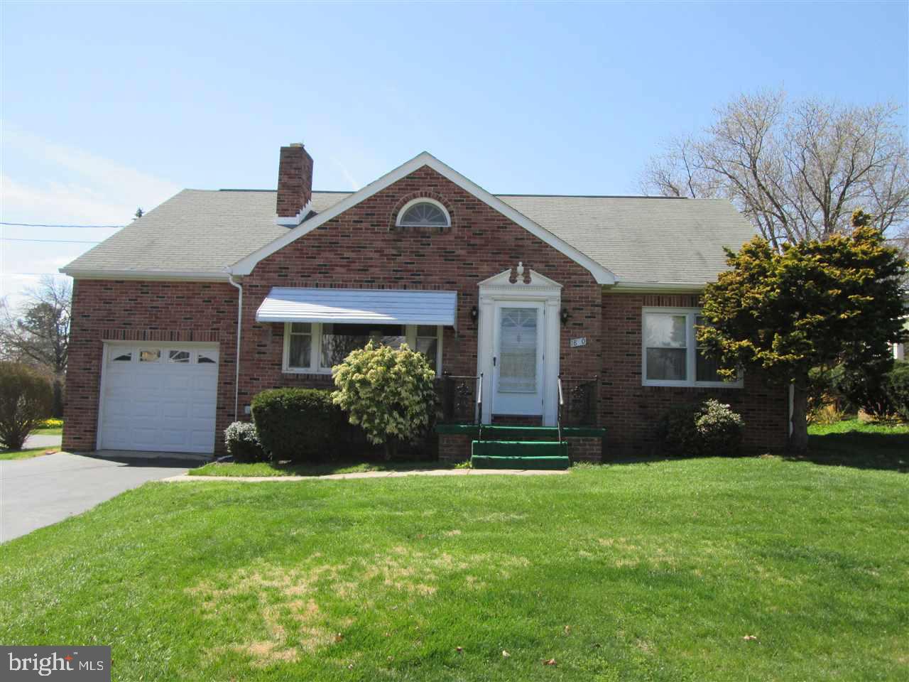 Estate Sale.  Bring your paint brush & call this place home!  Solid brick Cape Cod w/ 4 large BRS.  Fireplace in LR.  Hardwood flrs throughout.  Lots of sq ft & perfectly level & big back yard.  Updated electric, furnace & windows.  Open KIT/DR.  1-car Garage.  Great location in Central Schools.