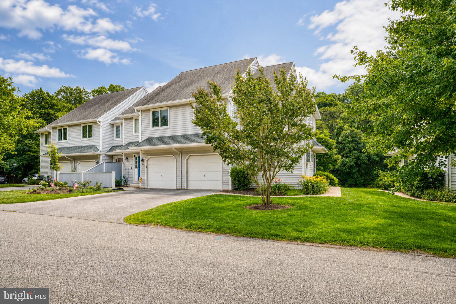 Welcome to 101 E. Thomas Court, an exceptional end-unit townhome nestled in the highly sought-after Orchard Valley community, offering one of the neighborhood's most picturesque waterfront settings. Perfectly positioned overlooking a tranquil pond framed by mature trees, this beautifully maintained 3-bedroom, 2-bath residence blends timeless design, thoughtful updates, and an unbeatable Chester County location.A charming entrance welcomes you into a bright and airy floor plan highlighted by soaring vaulted ceilings, oversized windows, and abundant natural light. Brand-new wide-plank flooring extends throughout the main level, guest bathroom, primary bathroom, and finished basement, while fresh paint throughout creates a crisp, modern aesthetic that's truly move-in ready. The dramatic two-story living room is anchored by a cozy wood-burning fireplace and opens seamlessly to the expansive rear deck, creating the perfect setting for entertaining or simply relaxing while enjoying peaceful pond views. The updated kitchen features quartz countertops, stainless steel appliances, abundant cabinetry, and a sunny breakfast area. Just beyond, the dining space offers direct access to the rear deck, making indoor-outdoor living effortless. The spacious primary suite provides a peaceful retreat with an en-suite bath, generous closet space, and abundant natural light. As an added bonus, enjoy seasonal views of the spectacular Longwood Gardens fireworks right from the comfort of your primary bedroom. Two additional bedrooms provide flexibility for family, guests, or a home office, while the loft overlooking the living room creates the perfect space for a home office, reading nook, or additional lounge area. The finished basement offers valuable additional living space, ideal for a recreation room, fitness area, media room, or playroom, while the attached garage features custom built-in shelving for exceptional storage and organization. Step outside to your private rear deck and experience one of Orchard Valley's most desirable settings. Overlooking the serene pond and surrounded by mature landscaping, this outdoor retreat is the perfect place to enjoy your morning coffee, unwind after a long day, or entertain family and friends. Ideally located just minutes from Longwood Gardens, vibrant downtown Kennett Square, boutique shopping, award-winning restaurants, and the renowned attractions of the Brandywine Valley, this exceptional home is also located within the highly acclaimed Kennett Consolidated School District. Offering maintenance-free living, garage parking, a finished basement, premium updates, breathtaking pond views, and one of the finest locations in Orchard Valley, 101 E. Thomas Court is a rare opportunity to own an exceptional home in one of Chester County's most desirable communities. Schedule your private showing today.