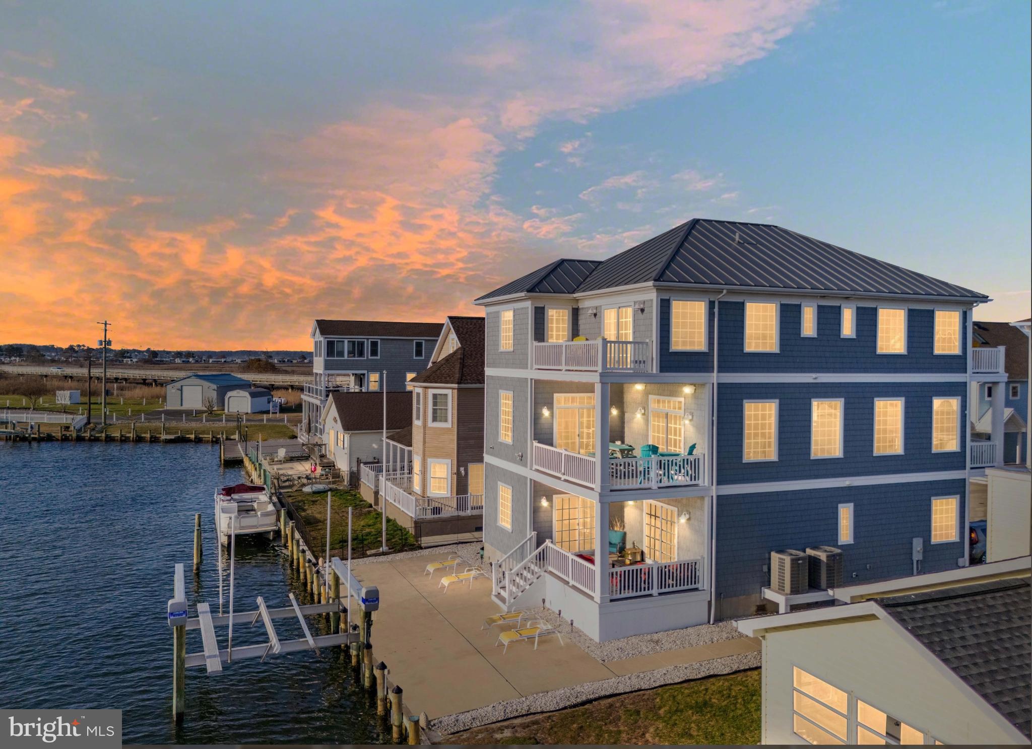 Located in the private community of Cape Windsor, residents enjoy amenities including a community pool, boat ramp, and easy access to the bay, all just minutes to Fenwick Island beaches and Ocean City attractions.
This is a rare opportunity to own a large waterfront home in one of the area's most desirable coastal communities—perfect as a primary residence or a vacation getaway, Experience the ultimate in coastal living in this expansive waterfront home offering 6 spacious bedrooms and 6.5 baths, perfectly designed for comfort, entertaining, and multi-generational living. Ideally situated on a prime bulkheaded lot, this residence provides direct water access to the bay—perfect for boating, crabbing, and enjoying life on the water. Step inside to discover a light-filled open floor plan with generous living spaces, multiple ensuite bedrooms, and thoughtfully designed interiors that blend coastal charm with modern convenience. The home offers 6 bedrooms and 6.5 bathrooms providing ample room for guests, with private retreats on every level. large family room with open kitchen. Home comes  furnished , has elevator and 2 laundry rooms for your convenience . Outdoor living is just as impressive—enjoy waterfront views, relaxing breezes, and endless sunsets from expansive decks and outdoor entertaining areas. Plenty of space for docking your boat and embracing the coastal lifestyle. An excellent opportunity as a luxury vacation home,  or primary residence—this property offers versatility, space, and the best of coastal living.