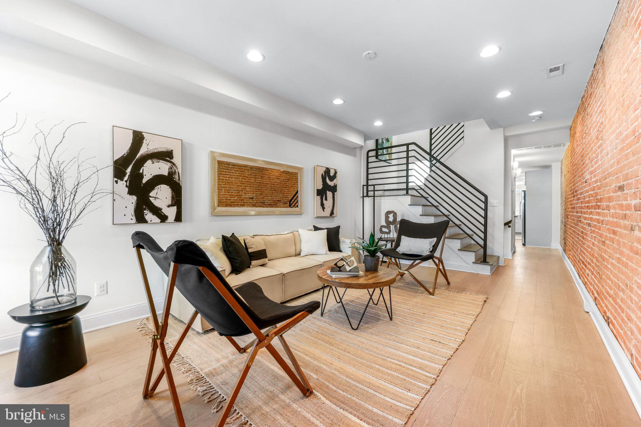 Completely rebuilt in 2018 as a one-of-a-kind custom residence, enjoy 19th century exterior architecture with 21st century wiring - this extraordinary 3 bedroom 2.5 bathroom home offers a level of craftsmanship, design, and functionality rarely seen in Baltimore. Thoughtfully curated with high-end finishes throughout, the home seamlessly blends modern luxury with warm, timeless style. Rich hardwood flooring flows throughout the living spaces, while the gourmet kitchen serves as the heart of the home with premium finishes, custom details, and an ideal layout for both everyday living and entertaining.

Natural light pours into every room, creating an airy and inviting atmosphere that highlights the home’s impeccable design. The stunning spa-inspired bathrooms feel straight out of a luxury boutique hotel, while oversized closets provide exceptional storage rarely found in city living. A large basement offers even more flexibility with abundant storage space which is always an added bonus. 
Outside, the expansive private yard is truly a rare city oasis — fully fenced and thoughtfully designed with ample space for gardening, entertaining, dining al fresco, or simply relaxing in peace. Perfectly positioned just moments from Fells Point and Harbor East, this location offers the very best of Baltimore living with acclaimed restaurants, waterfront attractions, nightlife, and shopping all just steps away.

This is not simply a renovation — it is a completely reimagined custom home unlike anything else on the market.