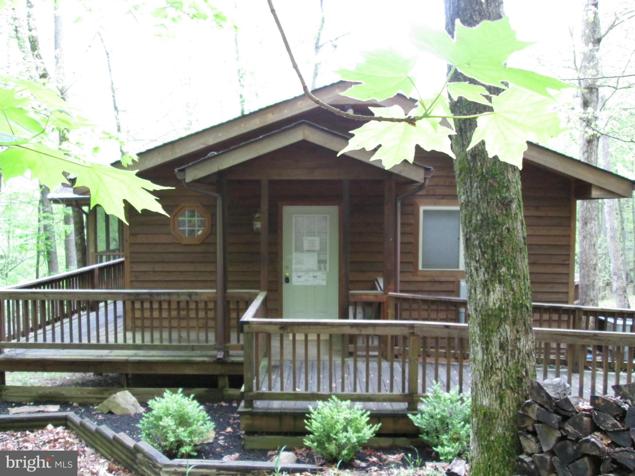 Freddie mac First Look initiative ends 5/30. Cedar sided contemporary cottage. Move-in ready,has large great room with fireplace, cathedral ceilings, wood floors on main level, 3 BR, 3 full baths,  screened porch & decks. Community has pool, tennis courts, mountainside hiking trails, large recreation barn. Buyer to verify all information. For owner occupant seller provides up to $500 home warranty