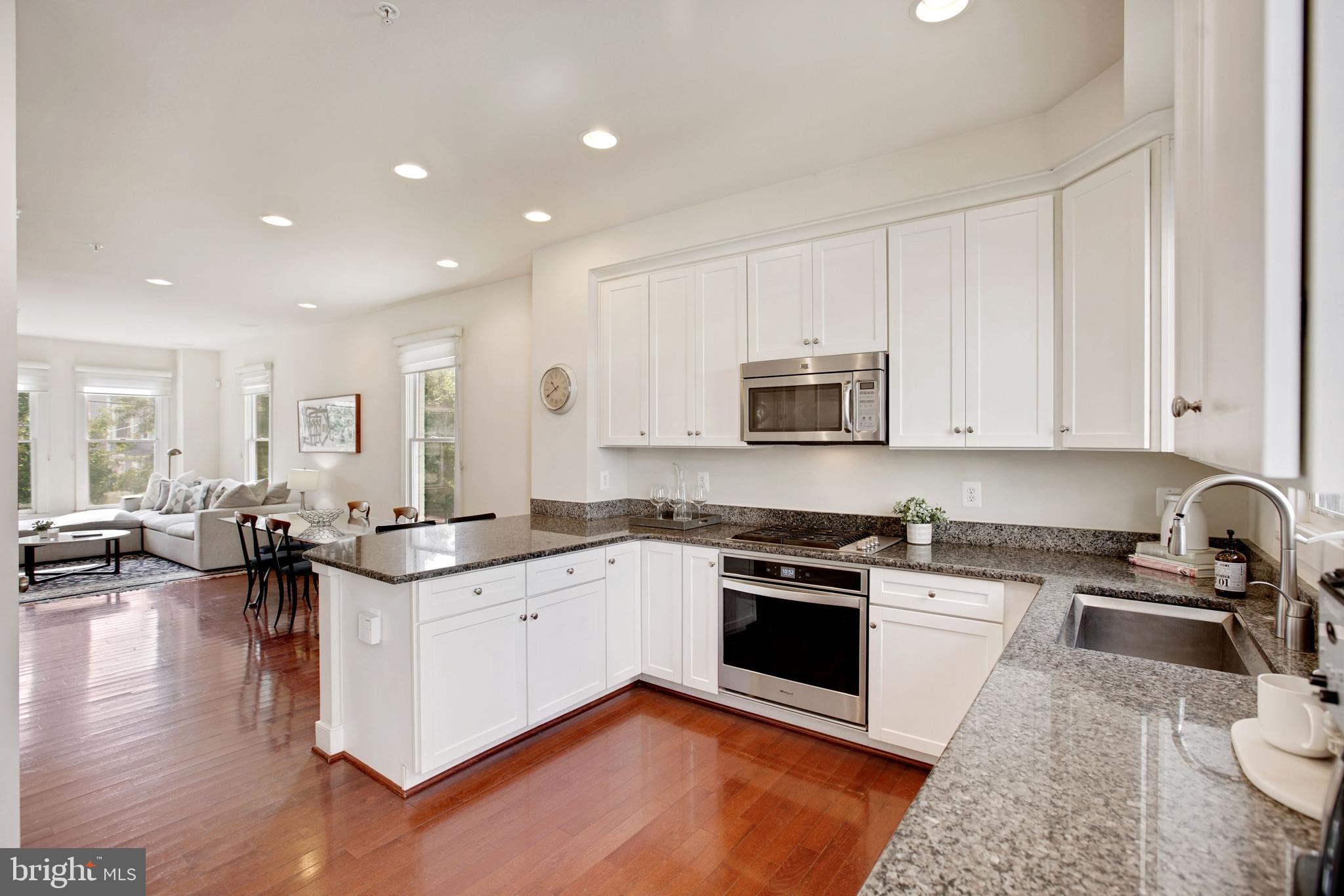 4 BR, 3.5 BA end unit townhome in the ideal Old Town location. Shop, dine, and work right outside of your front door. Welcoming entrance leading to the perfect sunny home office (4th bedroom) with large closet and French doors for privacy. Open concept living with hardwood floors and high ceilings on the main level - perfect for entertaining. Amazing Chef's kitchen - granite counters, custom cabinets, stainless steel appliances, gas cooking, breakfast bar, and pantry.  Deck off kitchen great for morning coffee and year round grilling.  Gracious dining room accommodates larger dinner parties with room for a buffet or beverage cart. The comfortable and bright living room overlooks the quiet tree lined street. Great details including recessed lighting. Spacious upper levels with a Primary Suite featuring a walk-in closet and spa bath including dual granite vanity and oversized shower. All bedrooms with ensuite baths. Convenient upper level / bedroom level laundry. Rooftop terrace retreat with generous recreation room ideal for movie nights, home gym, or play room and third bedroom suite perfect for your out of town guests. One car garage w/storage. House including carpets will be cleaned after lease signing and ready to move in - just needs you to call it home! Only 4 blocks to Metro, 10 minutes to DC via GW Parkway or the Pentagon via Metro. The best of all worlds - conveniently located close to small, local restaurants and shops along King Street, but just a short distance to larger scale retail at Potomac Yard and just around the corner from multiple grocers. Just outside your front door, one block away is the Charles Houston Rec Center with a state of the art gym, exercise classes, outdoor pool and playground - fun for everyone!