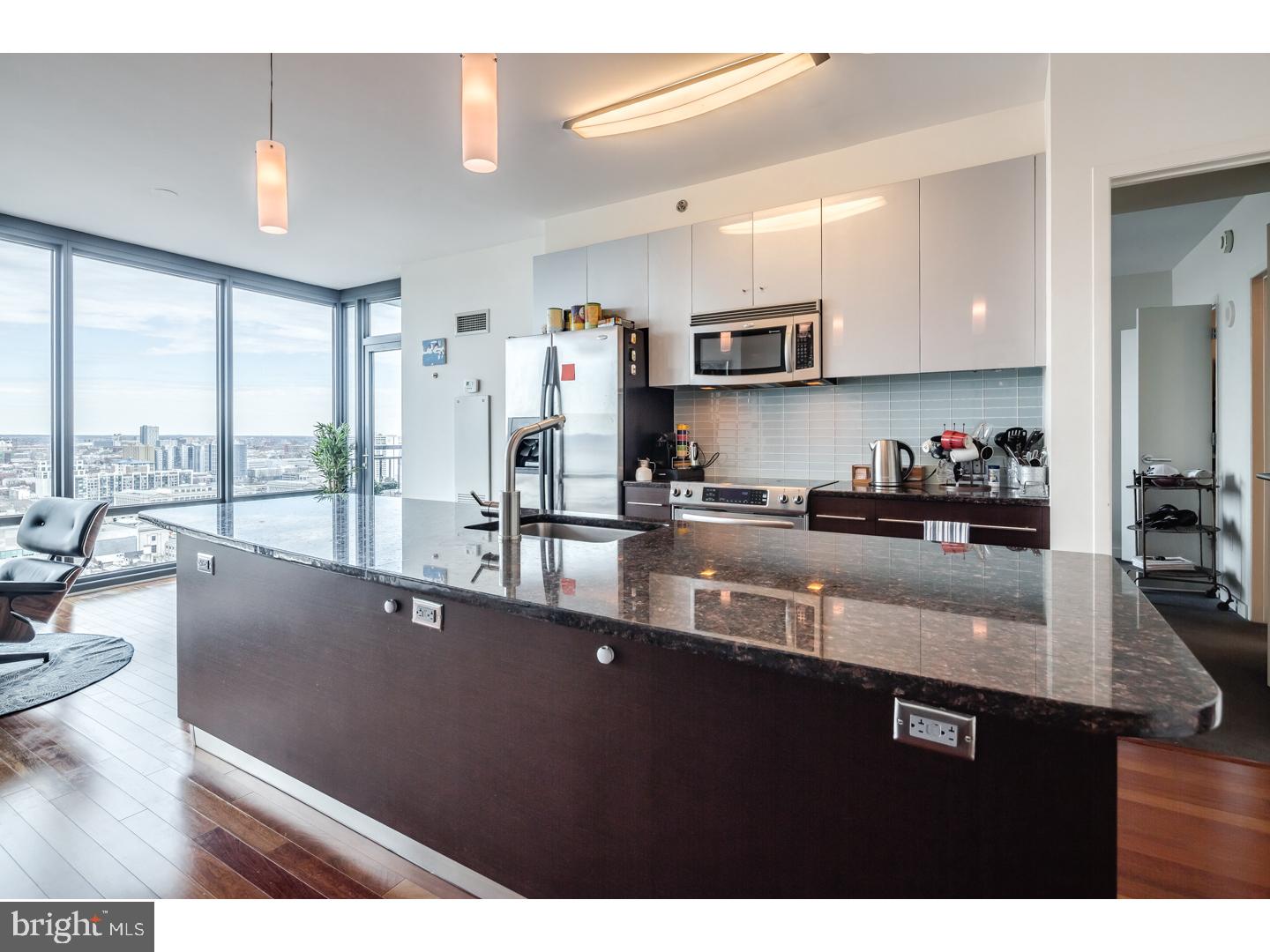 Extremely RARE offering - Live every day like a VIP in one of the most exciting buildings in Philadelphia, The Murano! This unit features endless North views, granite counter-tops, stainless steel appliances and darker wood flooring, PARKING and STORAGE. The building offers 24 hour concierge service, 24 hour heated lap pool, and a state-of-the-art gym at your disposal. Parking & storage is included in the price!! Amazing views!