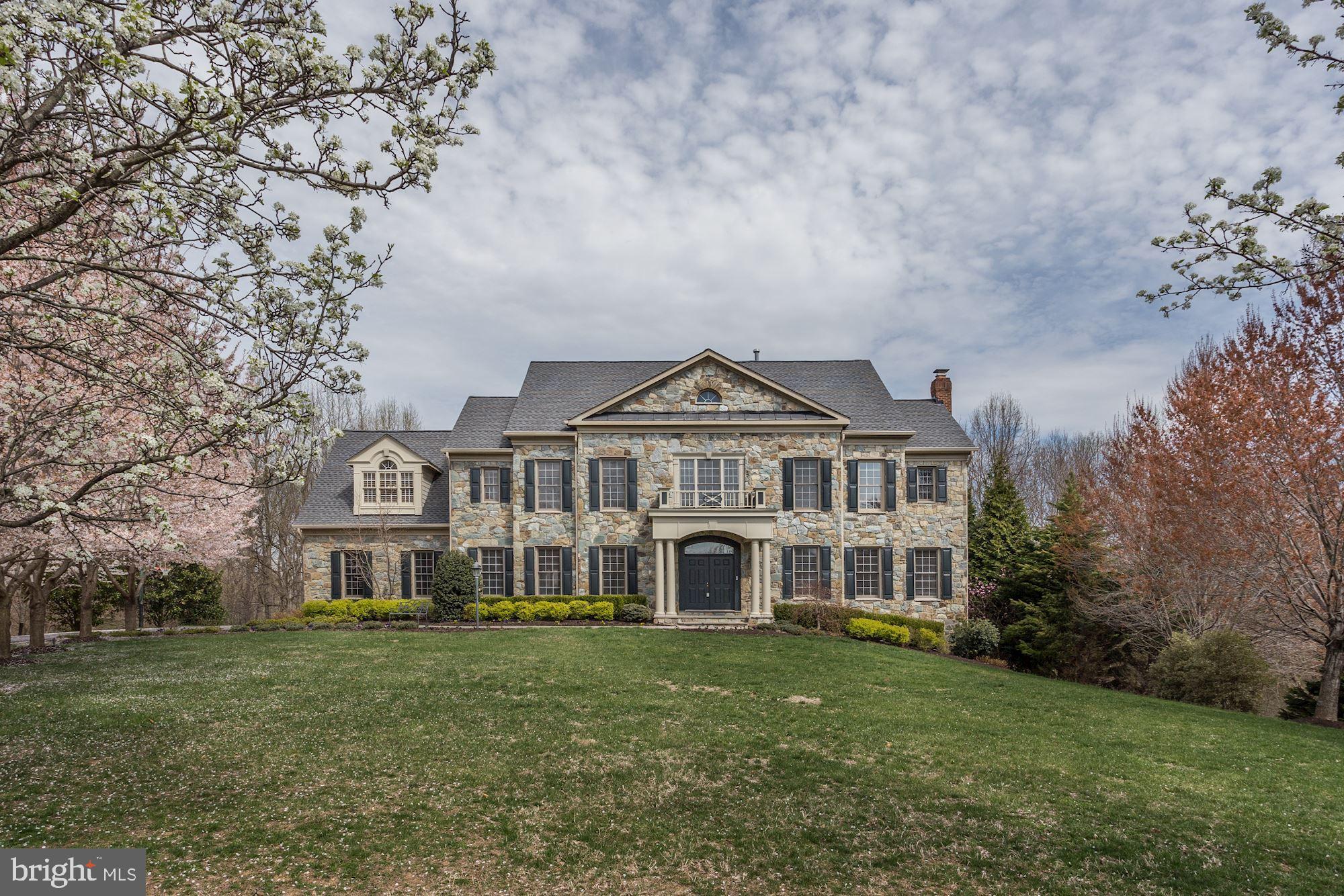 This extraordinary stone front Craftmark Home offers over 9,000 sq. ft. of elegant living space in desirable cul-de-sac location. With four levels, 7BR | 7.5BA, this home is ideal for those seeking the perfect blend of nature and room to entertain without compromising the convenience of access to amenities or I-495. Walk to the C&O canal or take the bike path to Potomac Village. This entertainer s paradise offers an expansive kitchen featuring an island, breakfast room and additional counter space for bar stools. Over-sized sliders in kitchen lead to a custom Trex deck with automated awning that overlooks the backyard backing to over 50 acres of preserved parkland. Also enjoy this scenic setting from the screened-in porch with ceiling fans or expansive lower patio with beautiful paver walkway, built-in outdoor grill with granite counters, fire pit with stone knee wall & seating area with second automated awning! Master suite features spacious sitting room, marble bath with Jacuzzi and dual headed shower. Don t miss the tree-house/playhouse with electricity, loft area and internet! See fact sheet for further details.