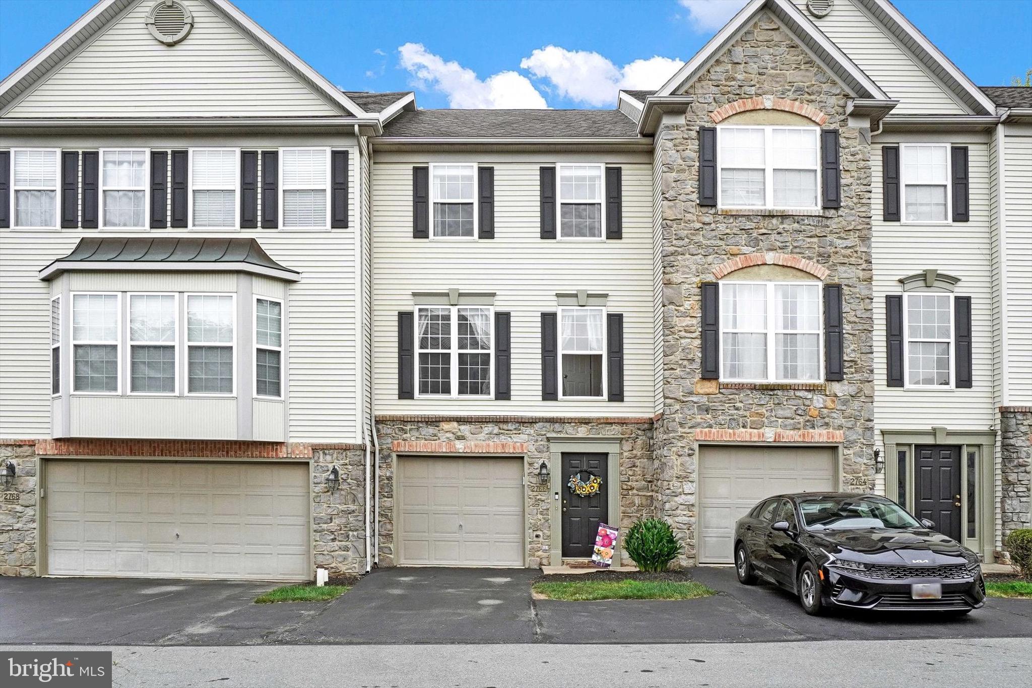 This condo is one of the most affordable homes in Dallastown Schools right now! You will love living life at Hunt Club Condos! The first floor features an oversized garage, laundry room and a large storage room which offers additional space if finished for a family room, office or a gym. The main level includes a spacious eat in kitchen with ample counter space for cooking, a pantry and abundant cabinet storage. There is also a dining area in the kitchen that can accommodate a large table. The spacious living room offers high ceilings and a wall of windows that allow plenty of natural light to brighten the room. Two spacious bedrooms are located on the second floor. The primary bedroom has a walk in closet and primary bath. There is also guest/overflow parking located down the street!  This fabulous townhouse is very competitively priced and conveniently located close to shopping, I-83 and Route 30! Could possibly be bought and used as a rental-check with the HOA to confirm.