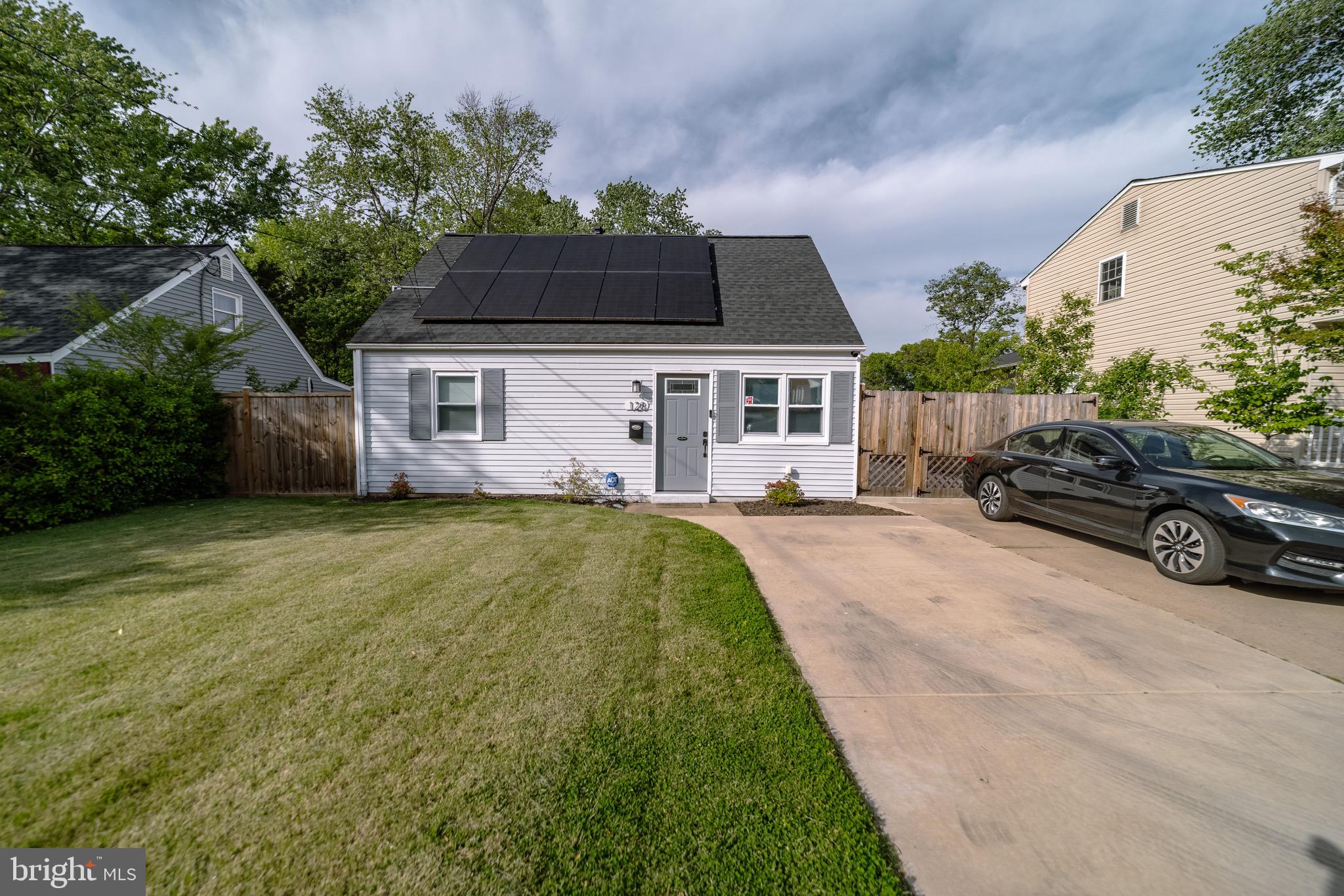 Welcome to this beautifully renovated Cape Cod in the heart of Manassas Park, where charm, comfort, and modern upgrades come together seamlessly. Thoughtfully updated from top to bottom, this move-in ready home offers timeless curb appeal, with an updated 2-car cement driveway, fully fenced backyard, storage shed with custom Driftwood Grey stain, and the freedom of no HOA. An added bonus is the fully paid-off solar panel system at settlement, allowing the next owner to enjoy significantly reduced electric bills for years to come without the upfront investment.
Inside, natural light pours into the spacious living areas, luxury vinyl plank flooring, 2 yo windows, fresh drywall, modern lighting, and stylish finishes throughout. The updared kitchen features quartz countertops, custom cabinetry, tile backsplash, stainless steel appliances, and convenient access to the side yard and driveway—perfect for everyday living and entertaining alike. The main level includes two generously sized bedrooms with updated ceiling fans and a beautifully updated full bath with a new tub and tiled surround. Upstairs, the expansive bonus space offers incredible flexibility as a third bedroom, guest suite, home office, or creative retreat, along with an updated washer and dryer area. Additional major improvements include a newer roof and a 2-year-old central heating and air system for added peace of mind. Conveniently located near shopping, dining, parks, and commuter routes, this exceptional home combines character, functionality, and value all in one. Schedule your private showing today and experience everything this home has to offer.