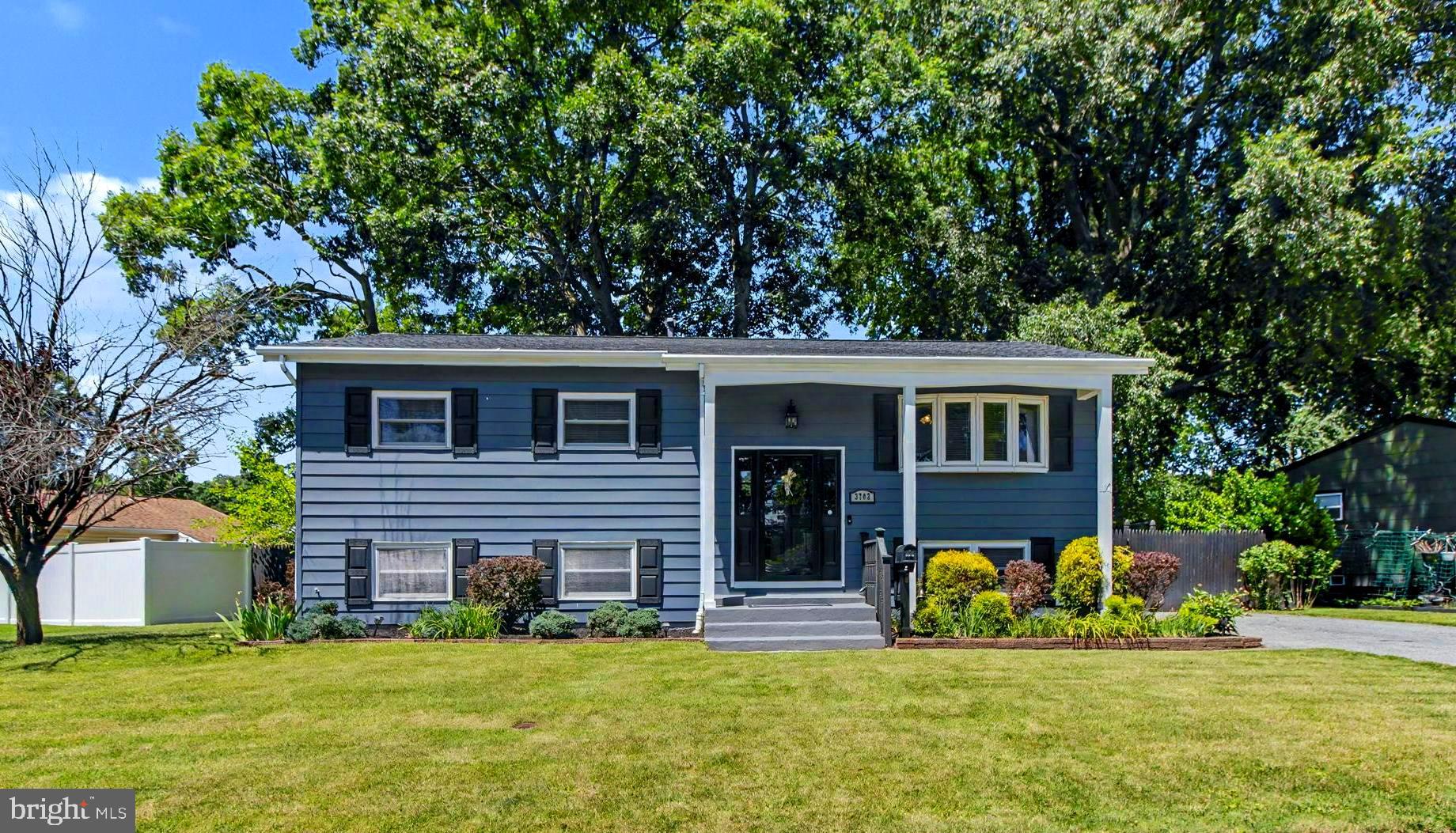 ** GORGEOUS! ** Move right into this beautifully renovated 4-bedroom, 2-bath Carrollwood home, filled with contemporary flair and tasteful decorator touches throughout. Highlights include unique lighting, custom molding wall accents, and hardwood floors across the main level. The stunning renovated kitchen features 42-inch soft-close white cabinetry, granite countertops, stainless steel appliances, and a tile backsplash. The main level offers three bedrooms and an updated full bath with a tiled bath surround and modern fixtures. The finished lower level includes a huge recreation room, fourth bedroom, renovated full bath with a walk-in shower, laundry room, oversized storage/utility room, and access to the covered patio.
Enjoy the landscaped level lot with a privacy-fenced rear yard, storage shed, covered side entry to the kitchen, and ample driveway parking. *** Truly a GREAT FIND! ***