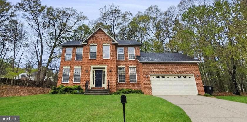 Possible Short Sale. Owner Occuoied-Do not disturb. No offers for 15 days.
 Welcome home to this beautifully maintained brick Colonial tucked away on a peaceful cul-de-sac. Featuring gleaming hardwood floors throughout the main level, this home offers a spacious and inviting layout perfect for everyday living and entertaining. The expansive primary suite includes a private ensuite bath, creating the perfect retreat. Enjoy the open-concept kitchen and living area filled with natural light and designed for gathering with family and friends. The finished basement provides additional living space ideal for a recreation room, home office, gym, or guest area. A wonderful combination of comfort, space, and location!