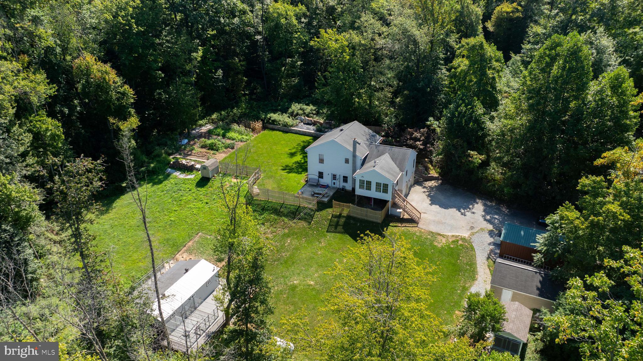 This property is going to onsite auction 4/7/2025 at 5:00 PM and is being sold with reserve. LISTED PRICE IS ONLY A SUGGESTED OPENING BID AND IS NOT INDICATIVE OF THE FINAL SALES PRICE WHICH WILL BE BY SELLER CONFIRMATION DAY OF AUCTION.  Terms: Down payment of $30,000 required day of auction. Settlement on or before June 6, 2025. Transfer taxes to be paid by buyer. Real Estate taxes shall be prorated.
This super quiet country property offers the perfect balance of privacy and accessibility. Property is situated in Chester County’s Sadsbury Township, just minutes from essential amenities such as grocery stores, drug stores, gas stations, and hardware stores.
The home is designed for both comfort and functionality, featuring a daylight basement with walk-out access and a spacious all-seasons room on the main floor, ideal for year-round enjoyment.
For those in need of workspace or storage, the property includes a 14x20 shop/garage with an overhead door. Animal owners will appreciate the 12x34 horse barn with two stalls and the well-equipped 14x30 dog kennel, which offers 10 runs, heating, air conditioning, and a water treatment system. An additional 8x13 dog kennel adds to the property's versatility.
Serviced by an onsite well and septic system. Property is in the Octorara Area School District. with a tax parcel #36-02-0029, with 2024 taxes at $7,449.
Broker participation is available—details can be found on the website. Bridge loans are also offered; interested parties should contact the auctioneer for more information.