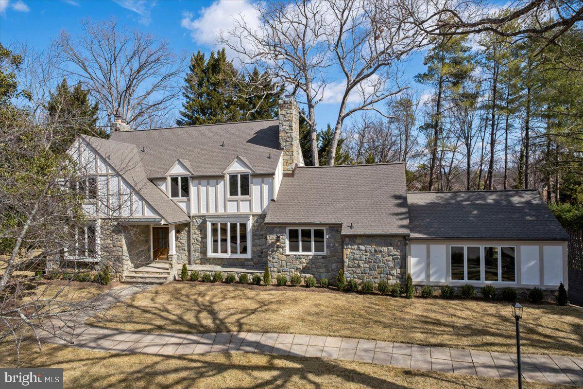 Extensively restored and expanded Tudor style home in prime Alexandria location in Belle Rive. 7,000 sq feet of living space situated on level half acre grounds on quiet cul de sac. No expense was spared from the exterior through the interior in creating this 6 bed/6.5 bath four level masterpiece in highly desirable Mount Vernon location resting on the original farmland of George Washington's Estate. All new plumbing, electrical, two HVAC zones including duct work, kitchen, baths, two laundry rooms, full basement waterproofing system, insulation, garage addition, roof, gutters/downspouts, three chimneys relined with new crowns and caps, interior/exterior lighting, interior/exterior paint, and the list goes on. Rarely does a property come available with this combination of quality restoration and preserved original character.  The home is just a short walk to Mount Vernon Estate, Mansion House Swim and Tennis Club, Grist Mill Park and a short drive to Mount Vernon Country Club, Hilltop Village Shopping Center, Old Town Alexandria, and all Washington DC has to offer.