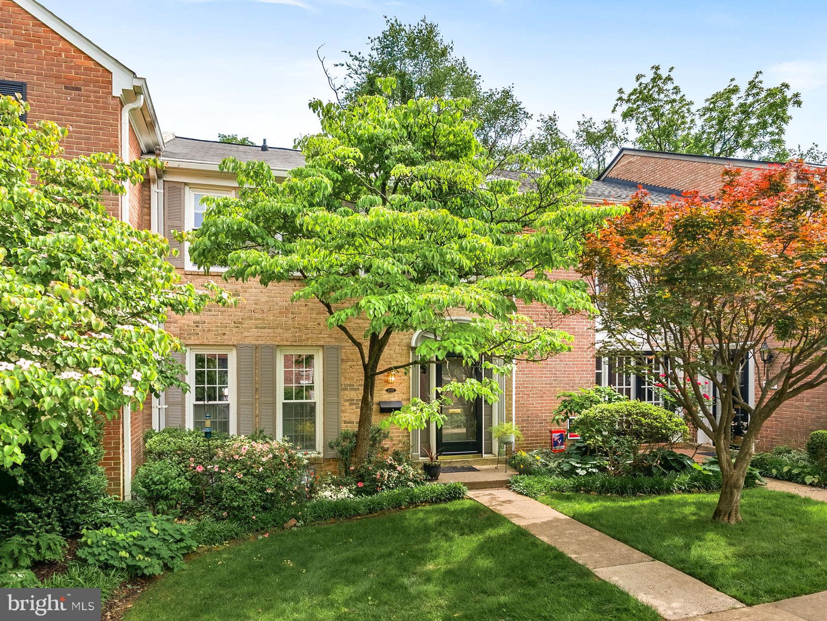 MULTIPLE OFFERS! Welcome home to this updated, all brick townhome featuring 3 spacious bedrooms, 2 full baths and 2 half baths, in a quiet enclave with private sidewalks and no through traffic! *Haycock Elementary, Longfellow Middle, and McLean High School pyramid* This home backs to mature trees and a peaceful common area, offering privacy and tranquility.  The bright eat-in kitchen boasts Silestone countertops, pull-out shelves, and updated cabinet hardware. Hardwood floors run throughout the main and upper levels, with ceramic tile on the lower level. The elegant dining room overlooks the impressive two-story living room, which features a cozy wood-burning fireplace with brick surround. The fully finished lower level offers a spacious recreation room complete with a wet bar, built-in bookshelves, an electric fireplace (conveys), a half bath, and a beautifully remodeled laundry room with granite countertops, a utility sink, and ample storage. The private fenced flagstone patio provides the perfect outdoor space for entertaining or relaxing. *Patio furniture and fire-pit convey!* The elegant primary suite includes a renovated bathroom with a walk-in shower, designer tile, and upgraded vanity. Plus, there are two spacious secondary bedrooms with hardwood floors and large closets. Recent updates include full interior paint and designer lighting in 2025, patio and fence improvements in 2023, a steel front door and shutters in 2021, attic fan and insulation in 2020, and a new heat pump in 2016. The roof and oversized gutters were replaced in 2015, along with the remodeled primary bath, washer and dryer, microwave, and hot water heater.
Located in the sought-after Haycock Elementary, Longfellow Middle, and McLean High School pyramid, this home is just 1.5 miles from the West Falls Church Metro station and minutes to I-66, I-495, and Dulles Toll Road. Air travel? You can choose between Reagan National and Dulles Airports. Enjoy easy access to downtown McLean, Tysons Corner, and the City of Falls Church, with nearby shopping, farmers market, and dining options. Assigned parking included. This hidden gem combines comfort, style, and convenience in an unbeatable location. Must see!