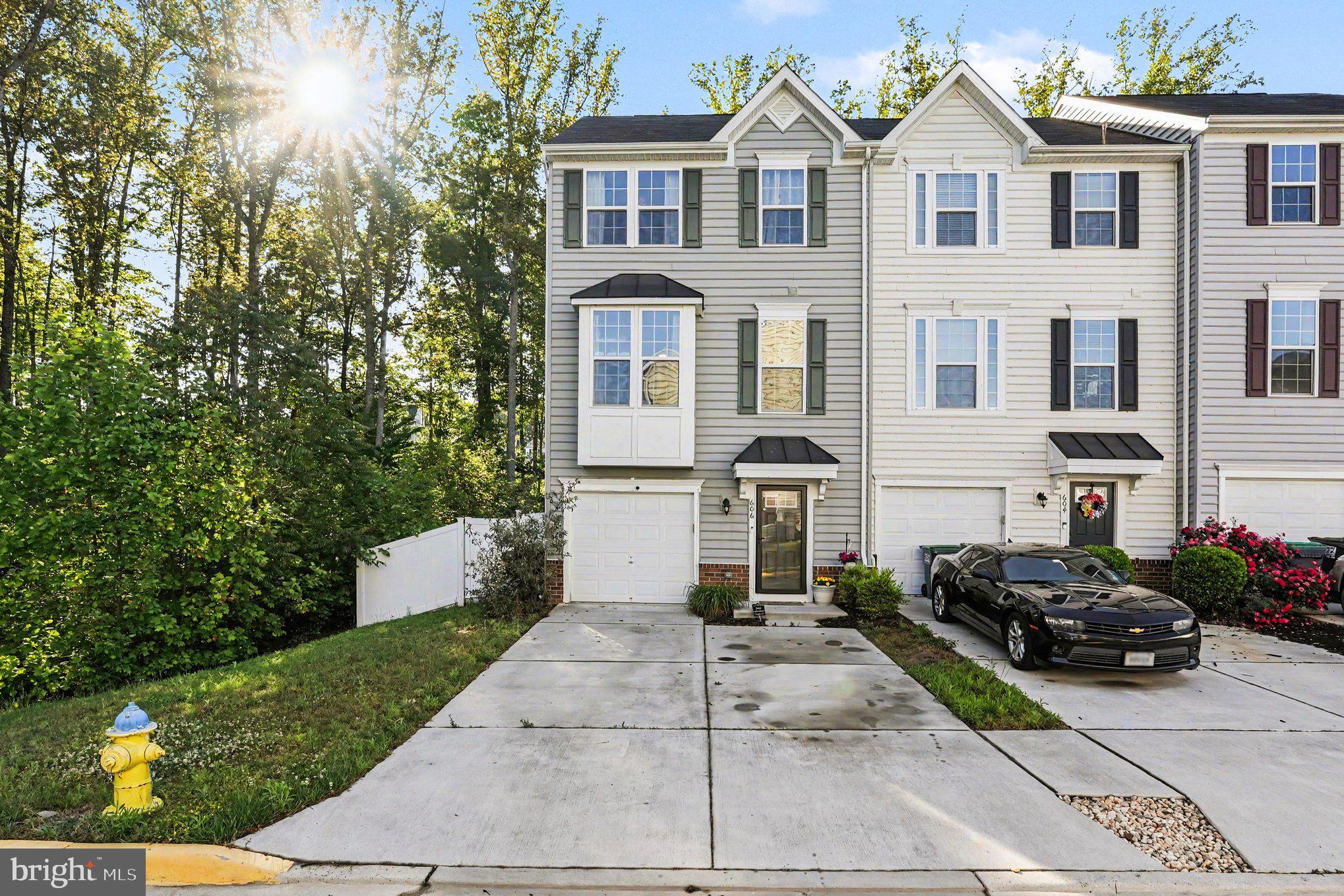 **Move-In Ready**Welcome to 606 Landing Dr— a beautifully maintained end-unit townhome offering over 2,300 square feet of living space on one of the most desirable lots in the community. Featuring 3 bedrooms, 3 full bathrooms, 1 half bathroom, and an oversized corner lot, this home combines modern living with indoor and outdoor space rarely found in townhome communities.
Step inside to an open-concept main level filled with natural light and designed for both everyday living and entertaining. The spacious gourmet kitchen features granite countertops, stainless steel appliances, a large center island with seating, abundant cabinet space, and an additional built-in coffee/bar area for extra storage and convenience. The adjoining living and dining spaces create an ideal flow for hosting guests or relaxing at home.

Upstairs, the spacious primary suite offers a tray ceiling, generous walk-in closet space, and a private bath with dual vanities and a soaking tub. Bedroom-level laundry adds everyday convenience, while additional bedrooms provide flexibility for family, guests, or home office space.

The finished lower level offers additional living space perfect for a recreation room, gym, office, media room, or guest area with its own full bathroom.

One of the standout features of this home is the outdoor living space. As an end unit situated on a premium lot, you'll enjoy an oversized fully fenced backyard with a stamped concrete patio, firepit area, deck, and additional yard space — creating the perfect setting for entertaining, pets, play, or simply enjoying your own private retreat.

Conveniently located near I-95, VRE stations, commuter lots, shopping, dining, and community amenities, this home offers the perfect balance of comfort, convenience, and space.