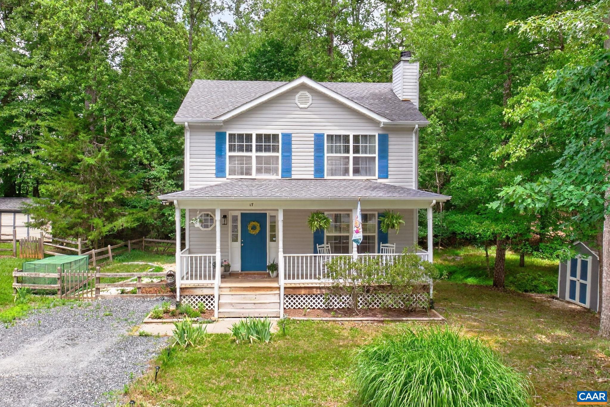 Warm and welcoming Colonial-inspired home with timeless cottage/farmhouse charm! Immaculately maintained and truly neat as a pin, this move-in ready home offers 3 bedrooms, 2.5 baths, and the perfect blend of comfort and character. Firefly internet. Recent updates include a new roof and new water heater, providing peace of mind for years to come. The inviting floor plan is complemented by a charming covered front porch?perfect for morning coffee, relaxing evenings, or greeting neighbors. Step outside to a peaceful, wooded backyard where a meandering stream and abundant wildlife create your own private nature retreat. Whether you're entertaining, gardening, or simply enjoying the sights and sounds of nature, this setting is sure to impress. Located in the sought-after Lake Monticello community 20 min to C'vlle, you'll enjoy access to boating, beaches, golf, tennis, parks, dining, and more. This lovingly maintained home is ready for its next owners to move in and enjoy!,Formica Counter,Wood Cabinets,Fireplace in Living Room
