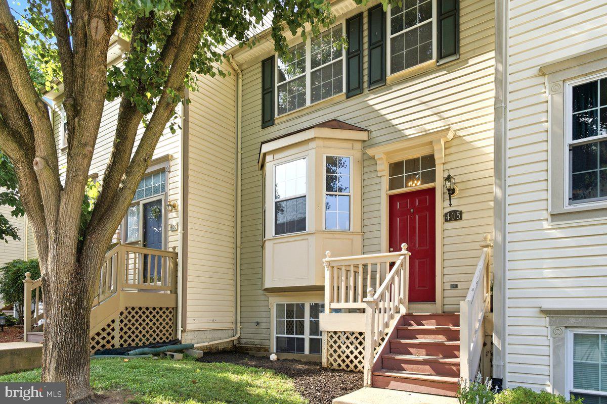 Welcome to 405 McDaniel Drive, a spacious three-level townhome located in Purcellville's Main Street Village community. With 4 bedrooms, 2 full baths, 2 half baths, and multiple living areas, this home offers a versatile floor plan designed for today's lifestyle.

The main level features an open and functional layout with comfortable living and dining spaces that flow into the kitchen, complete with granite countertops, ample cabinetry, and space for everyday dining. The upper level includes a primary bedroom with en-suite bath, additional bedrooms, and a hall bathroom.

The finished walkout lower level expands the living space with a recreation room, fourth bedroom, and half bathroom providing additional living space for guests, a home office, or other household needs. 

Step outside to the rear deck overlooking common area, providing additional space for outdoor enjoyment.

Residents of Main Street Village enjoy community amenities including a swimming pool, playgrounds, sidewalks, and common grounds. Conveniently located just minutes from downtown Purcellville's shops, restaurants, parks, and local attractions, with easy access to Route 7.