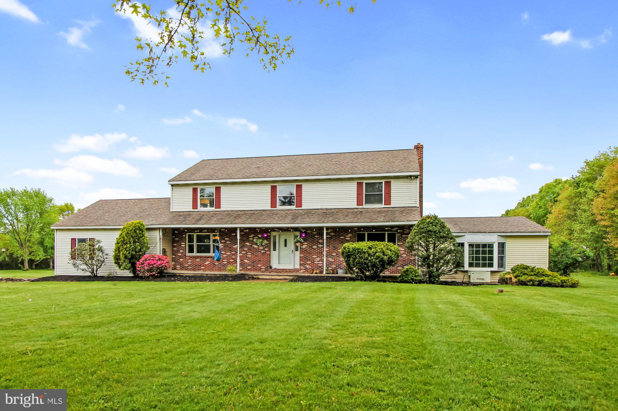 Come and see this spacious 3,192 square foot, 2-story home on 11.97 acres nestled in the quiet backroads of Perkasie. This home has a lot to offer including 4 bedrooms, 3 full baths, a large foyer, formal dining room with hardwood floors, formal living room (currently used as a gym), a family room with Brazilian Cherry hardwood and a wood-burning stove, and an open concept kitchen with tile flooring and stainless steel appliances. Off of the family room, you will even find a spacious bonus room with a skylight and stone accent wall. Completing the first floor is a convenient updated full bath with tiled shower that only needs a few finishing touches. Upstairs are 4 nicely-sized bedrooms, including a master bedroom suite with full bath and walk-in closet, and a full hallway bathroom with granite countertop vanity. This great home is setback down a long driveway with an attached 2-car side-entry garage, as well as a large detached 2-car garage with electric, an office/workshop area, and storage above. It also boasts a big deck, fire pit area, and an expansive backyard that is boarded by a beautiful treeline, and which could easily accommodate a barn and pasture. Please note that this home is an estate sale and being sold as-is.  This property is currently in Act 319.