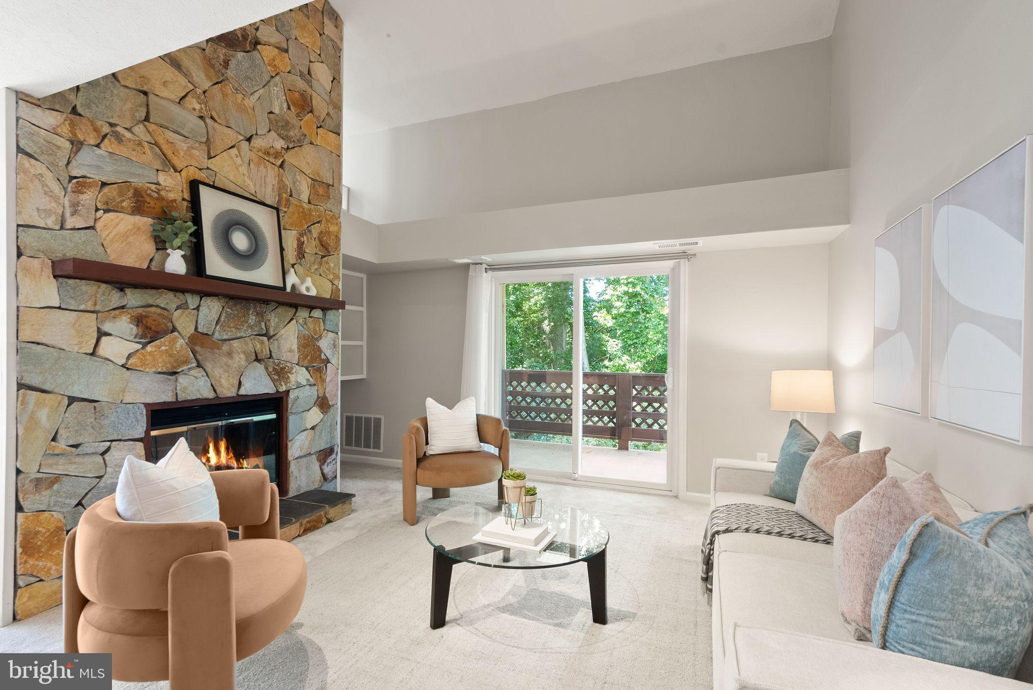 Welcome to 10158 Oakton Terrace. This large, 2 bedroom, 2 bath end unit has been meticulously updated and is ready for its new owner. This hidden gem is tucked away in the sought after Oakton Terrace community at The Oakton and is truly move-in ready. Enter on the lower level where you will find a welcoming foyer/mudroom area. Step up the main level to find an updated kitchen with new maple cabinets, quartz countertops, brand new stainless steel appliances and a nice sized pantry. The dining room is set for family dinners and has an opening to the kitchen and provides easy access and views to the updated kitchen. Step into the living room and you will find soaring ceilings, a wood burning fireplace and built-in shelving. Natural light abounds in this space through the sliding door to your private terrace where you can enjoy your morning coffee. The view from the terrace overlooks the beautiful treed and landscaped back yard. On this level you will also find a primary bedroom, a full bathroom, and a laundry/storage room. On the upper level you will find a second primary bedroom and full bathroom. This property is located in the Oakton High School pyramid and is close to local shops, restaurants and points of interest. Outdoor enthusiasts can enjoy the walking trails of Blake Lane Park and access to Oak Marr Recreation Center. There is a community pool and parking lot with two spaces.

Updates include: HVAC (2025), Fresh Paint Throughout (2026), New Carpet (2026), Kitchen Cabinets (2026) Quartz Countertops (2026), H2O Heater (2025)
