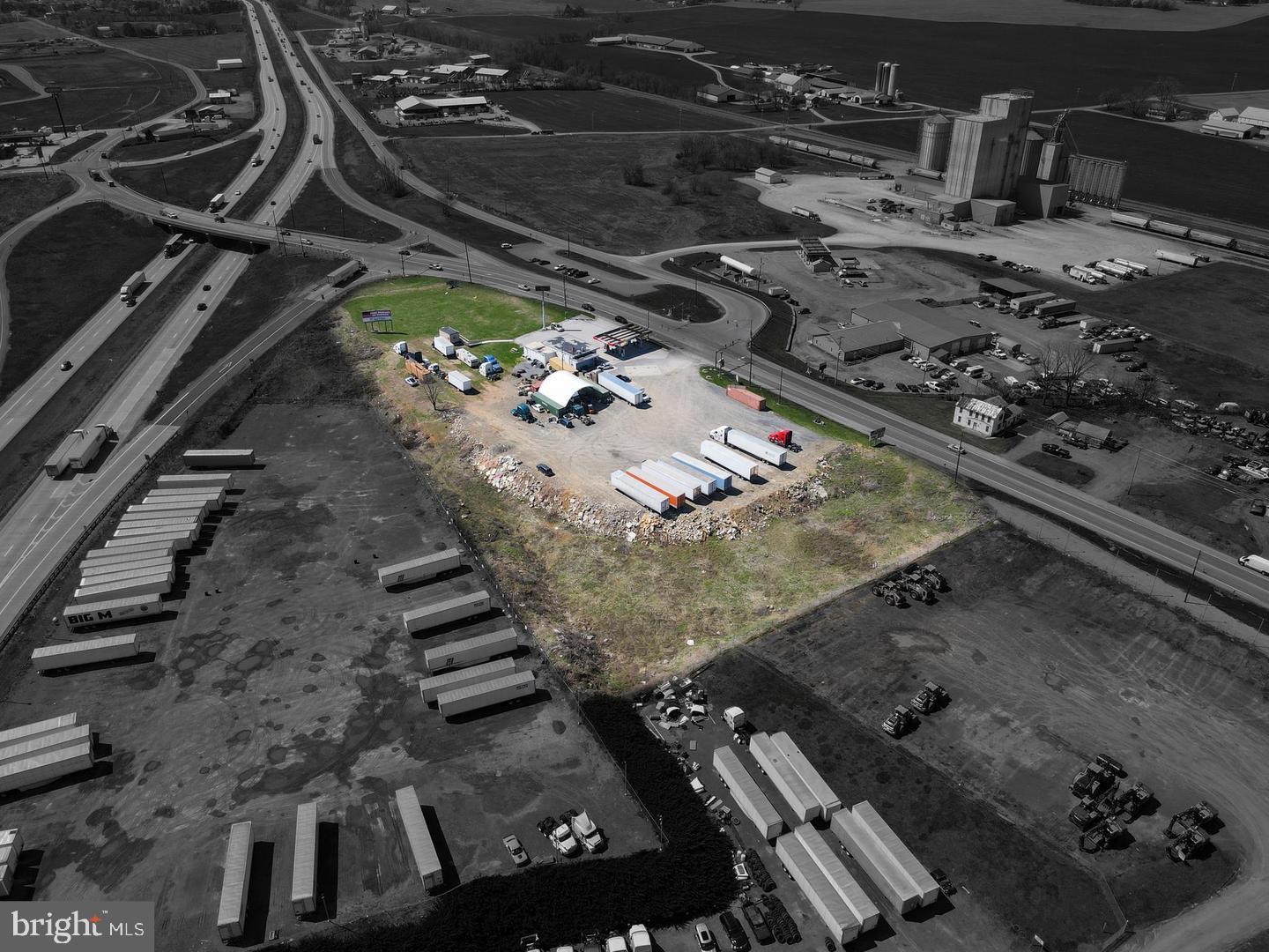 Prime Real Estate along Interstate 81 in the warehouse corridor, With over 100,000 daily drive bys, Industrial/commercial land surrounded by warehouses. Constantly growing industrial area. 3.99 Total Acres off of Interstate 81, Southbound exit 24. Includes two parcels (tax ID 21-0N14.-084.-000000 and 21-0N14.-081B-000000) Currently in use as a gas station with 5 pumps, convenience store, truck parking/stop. Two entrances/exits, one with a stop light. 4 Underground tanks current use as diesel, gas, and off road fuel