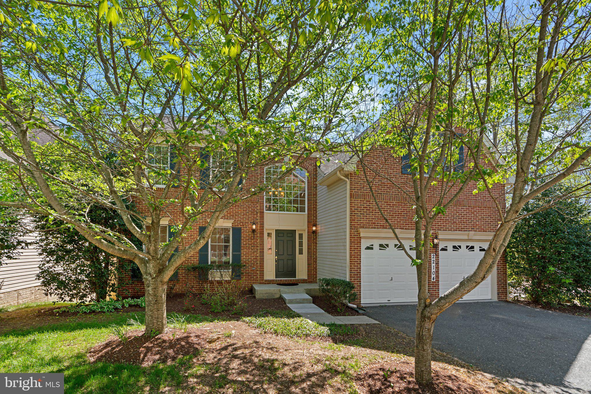 Welcome to 22104 Ginger Tree Way, a beautifully updated single-family home conveniently located near schools, retail, and easy access to commuter highways. This 4-bedroom, 2.5-bathroom residence offers an impressive 3,890 square feet of thoughtful living space, a perfect blend of comfort and style.

Step inside to find a two-story, sun-drenched inviting foyer, freshly painted to provide a welcoming atmosphere. The main level features gorgeous stained hardwood floors, creating a seamless flow throughout the living spaces. The spacious living room and separate dining room are perfect for entertaining guests. Work remotely and privately in the den/library with full length built-ins. The kitchen boasts granite countertops, an island, stainless steel appliances, including a new cooktop, and a new wall oven/microwave combo. The eat-in area is perfect for casual dining and opens to the freshly painted, cathedral ceiling family room with cozy gas fireplace and new carpet. 

Retreat to the four upper level bedrooms, where new carpeting and paint provides a fresh and modern feel. The primary bedroom offers dual walk-in closets and an ensuite bathroom, outfitted with new dual vanity countertops, updated lighting, a large soaking tub, and stall shower. The spacious secondary bedrooms and hallway full bathroom round out the upper level.

The lower level has a large finished rec area, as well as a rough-in and around 925sf of unfinished space for storage or to finish as you wish. Outdoor enthusiasts will appreciate the front and back yards, offering space for recreation and gardening. The property is next to a playground and adjacent to HOA-owned land, with no neighboring lots directly behind yours. An attached garage and driveway make for convenient parking.

This delightful property on Ginger Tree Way is more than just a house; it's a place to call home. Experience the perfect blend of elegant design and practical living in a prime location!