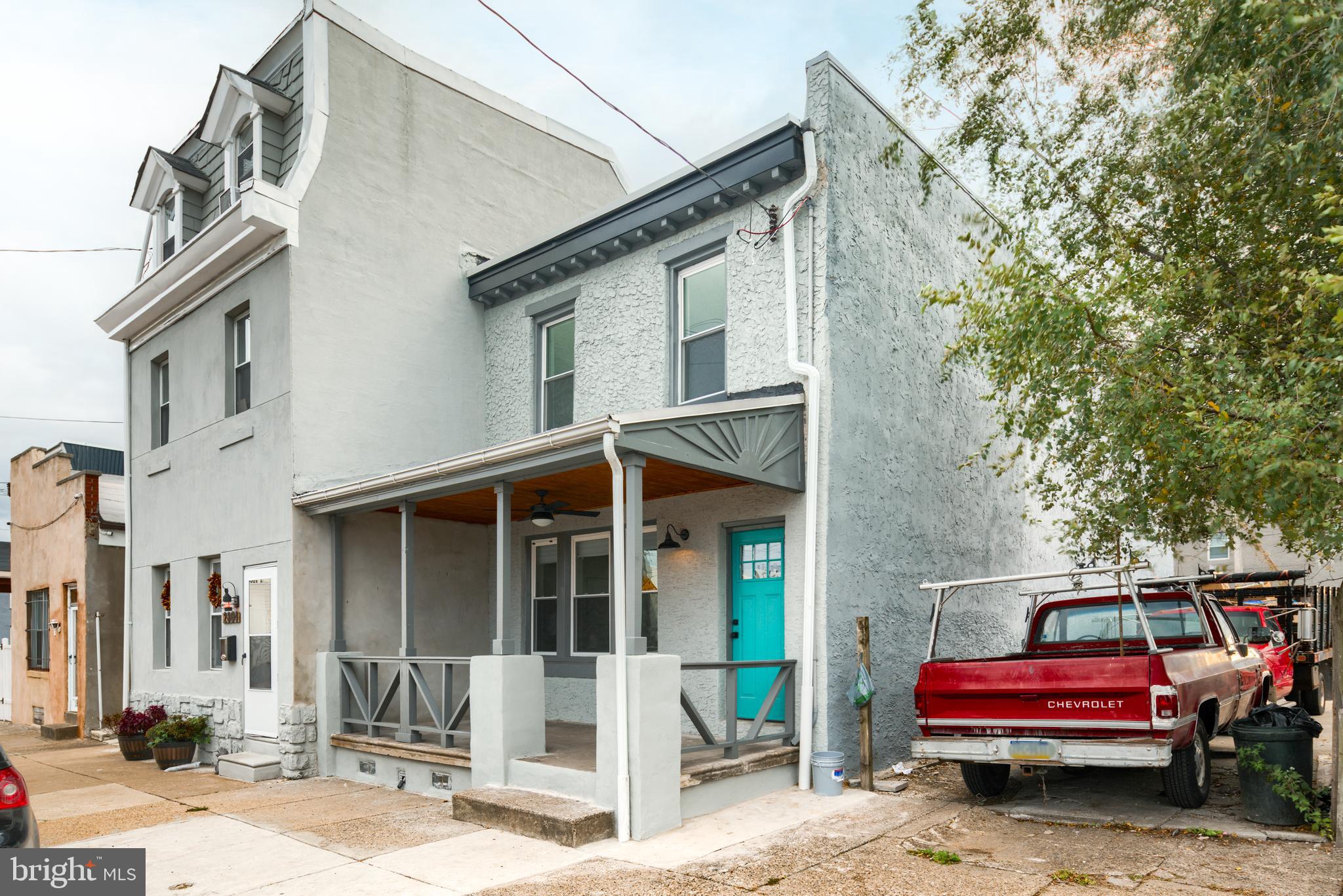 Completely renovated from head to toe in Bridesburg! Rare opportunity to get your hands on a twin house on an 18x97 lot  lot w/ front porch + huge rear yard  ! This 3 bedroom, 2 full + 1 half bath house has hardwood floors t/o, recessed lighting, new sheetrock, trim + paint, new windows, ceiling fans, doors, fixtures, gas fireplace, Smart Hvac system. New kitchen w/ quartz counters, 42 inch white cabinets, + stainless steel package. Custom built kitchen island that you will not find anywhere else.  Master bedroom has it's own full bath + loads of closets. Finished basement w/  mechanical room. New 100amp service, central air + heat and plumbing. Nest Thermostat, Ring Doorbell,  skylights, new stairs w/ custom rails Everything has been completed for you. Located on a great block w/ loads of parking and no congestion.