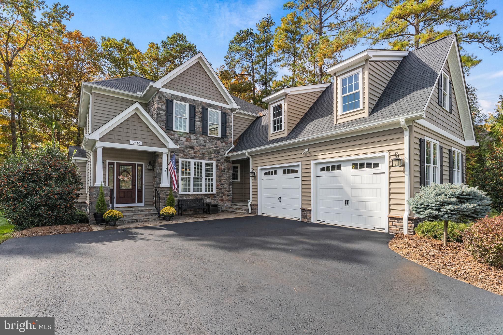 This nearly new home is located in an established neighborhood close to the community amenities of the gated Fawn Lake Community.   Built in 2015, the home features an open floor plan and is perfectly situated on the golf course.  Surrounded by mature trees, provides privacy and wonderful outdoor living space.  As you enter the home, you'll notice the welcoming Foyer that opens to the Dining Room with beautiful architectural trim.  Flowing through most of the main level is engineered hardwood flooring and stunning curved archways gracing the doorways.   Continuing past the staircase is the bright and beautiful Great Room featuring a gas fireplace and providing golf course views.  The well-equipped Kitchen boasts a five-burner cooktop, wall oven, microwave/convection oven, French door refrigerator, granite counters and so much more.  Nestled on the side of the Kitchen is a charming Dining area and access to the covered rear Porch.  Tucked beyond the Kitchen is a cozy Family Room overlooking the rear Porch and Golf Course beyond.  Down the hall is a Main Level Bedroom, currently being used as an Office with a convenient Full Bath nearby.  Completing the main level is the Laundry Room with utility sink and drop zone area.  Upstairs is the generous Primary Bedroom featuring a tray ceiling and sizeable walk-in closet.  Located across the hall are two additional spacious Bedrooms that share a connected Full Bath.   Enhancing the Upper Level is a fabulous Media Center/Flex space.  The Lower Level has been finished with waterproof Vinyl Plank flooring and features a Recreation Room and Game Area across the rear of the home.  Plumbing is also available to add a wet bar to suit your needs.  Down the hall is a Full Bath and a room being used for Exercise equipment.  Additionally there is plenty of unfinished space that can be utilized for all your storage requirements.  Located in the exclusive gated Fawn Lake community offering incredible amenities such as a 288-acre recreational lake with beach and marina, community club house, fitness center, pickleball, tennis, basketball, baseball, volleyball courts, soccer fields, walking trails, playgrounds, restaurants, a golf course and so much more!