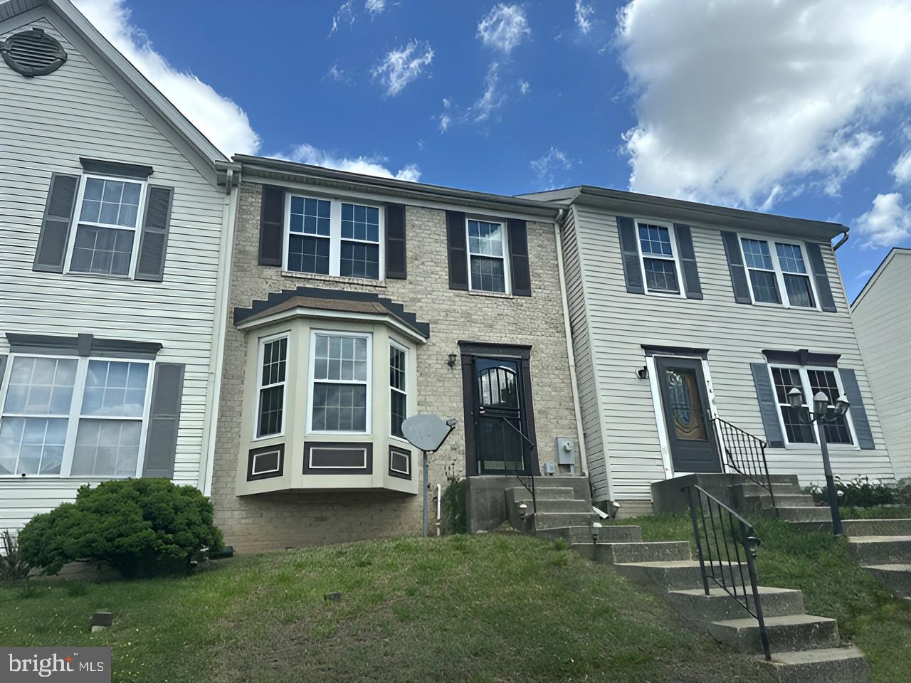 This Colonial style townhouse combines solid construction with convenient neighborhood access. Brick exteriors provide classic curb appeal and durability, while the finished basement expands living potential beyond the main floors.

The home features multiple bathrooms throughout. A large basement great room with fireplace creates flexible space for recreation, relaxation, or additional living needs. The lower level transforms into a functional extension of the home with its completed design. Brand new rear slider to deck installed.

Location highlights make daily errands and recreation accessible. The property sits near Bear Creek Park, offering outdoor recreation Nearby. Proximity to Dundalk Elementary School serves residents with school-age household members. Shopping convenience is within reach—Logan Village Shopping Center is nearby, and Merritt Park Shopping Center is just minutes away. Heritage Park provides additional green space in the immediate area.

This townhouse delivers practical value in an established Dundalk neighborhood with parks, schools, and retail all within easy reach.