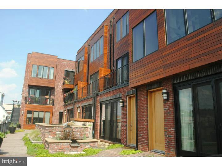 Each Phase 2 unit (1 & 2 bedrooms) are Flats with an open floor plan, wide plank hardwood floors field finished to buyer's preference. Kitchens include high efficiency GE appliance package including a gas range, Energy Star dishwasher and Fridge, pendant lighting over stunning Quarts Counters, soft close flat panel cabinets with stainless pulls, dual under mount sinks with chef's long neck faucet and garbage disposal. Baths include custom concrete vanities with the Ice House Seal, glass tile walls, and modern floor tile. Tailor your kitchen backsplash and baths with a wide variety of tile selections and vanity color choices. Each unit contains a full size high efficiency stackable Washer/Dryer and an Aprilaire filtration system that removes airborne particles such as dust and pollen from your home. Pet friendly of course. Project is FHA approved. Walker's paradise with cafes, parks, and public transportation right there. Intercom/buzz in system for condo to pedestrian communication Covered, secure, deeded parking available (listing price does not include parking), condo fees only $.25/sf, and incredibly low taxes with the 10 year tax abatement. PHASE 2 IMPROVEMENTS: 1) A centralized mechanical room with center floor drain, 2) Extra Storage above closets, Walk in Closets, Coat Closets, 3) 10' ceilings 4) Improved efficiency HVAC, improved efficiency hot water heaters 5) Higher end finishes with a wider array to choose from, 6) Hand Made Custom Bath Vanities, 7) A huge 2,700sf common roof deck with outdoor kitchen, a Green Roof and Dog Park, and amazing City, Bridge and River views 8) 10 full years on the Tax Abatement.
