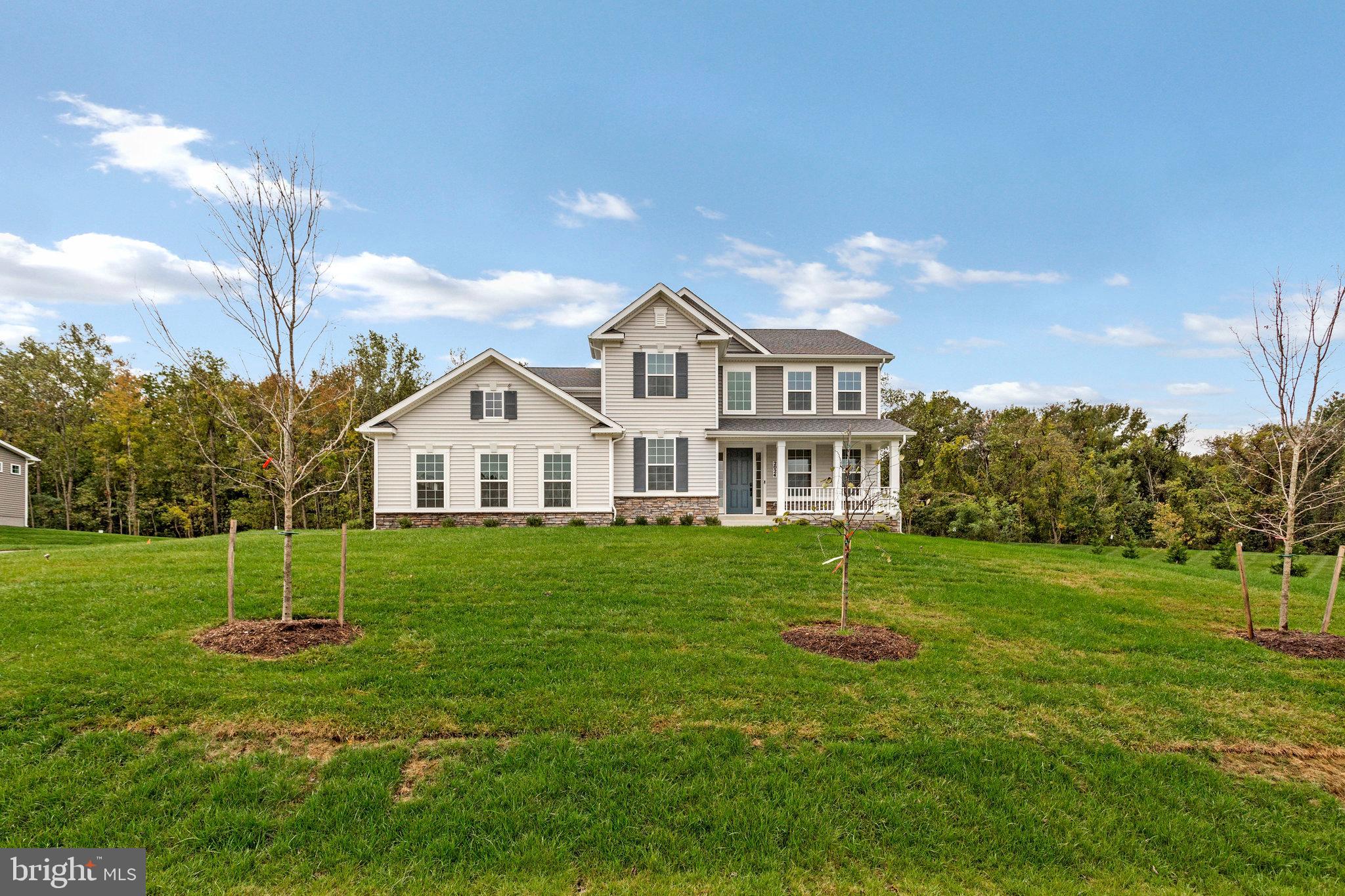 A dramatic two-story entry welcomes guests to the distinctive Donovan plan. The main floor offers a private study, a spacious great room with an optional fireplace and a formal dining room. An adjacent butler’s pantry leads to a well-appointed kitchen featuring a center island, walk-in pantry and optional gourmet features, and mud- and laundry rooms provide added convenience. Upstairs, discover three generous bedrooms with a shared bath and a lavish primary suite boasting an oversized walk-in closet and attached bath with double sinks. Other options may include a sunroom, deluxe primary bath, finished basement, covered patio and up to three additional bedrooms!