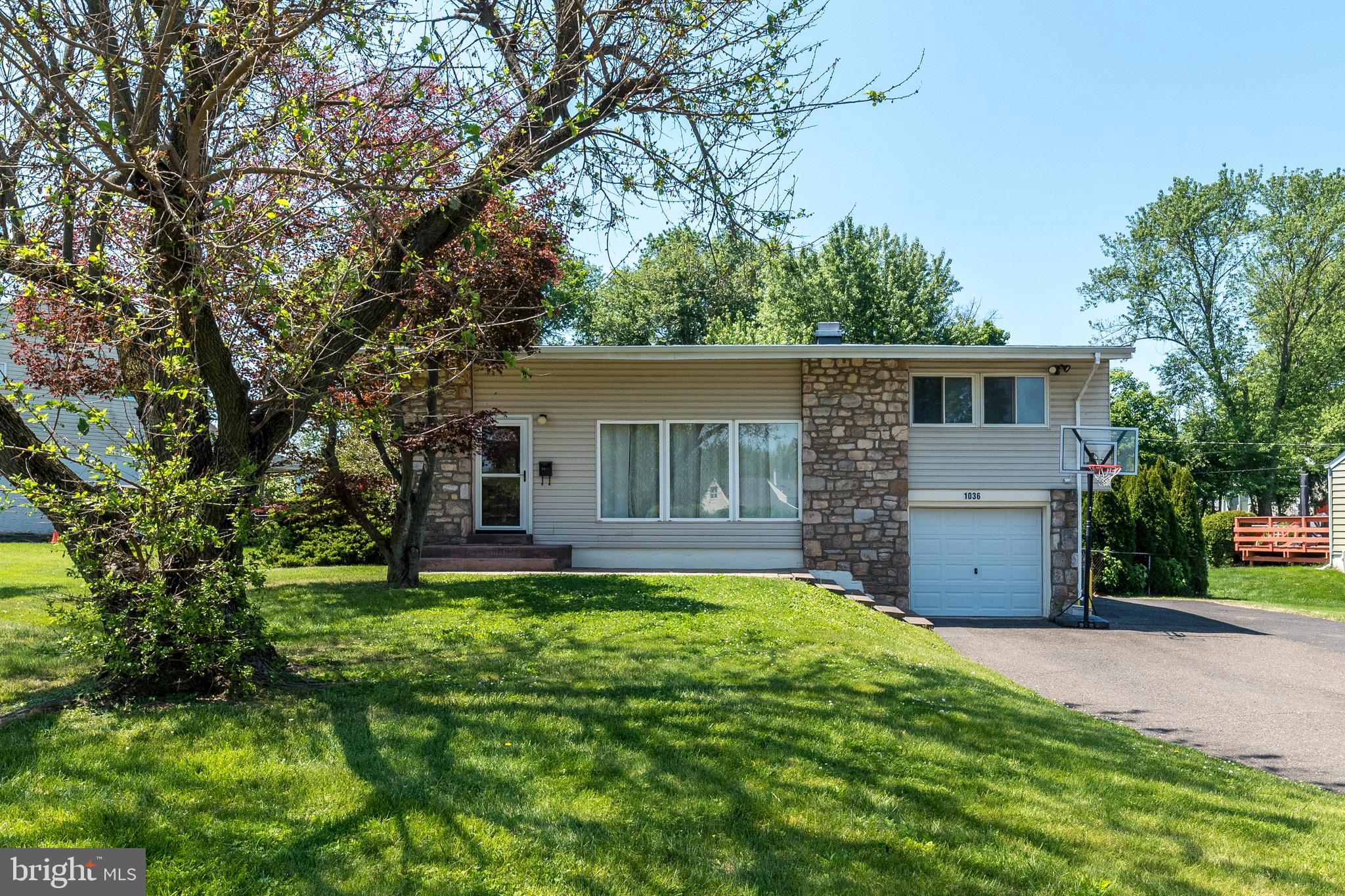 Welcome home to this wonderfully unique  split-level in Inglewood Gardens!  Check out this FIRST! Out back, 16'x16' Studio/Office/ Cabana? Incdes: A/C, heat, running hot and cold water. All is remote controlled.    Enter your new home and be impressed the terrific great room with vaulted ceiling, exposed beams, upgraded flooring and light pouring in through a large wall of windows. The kitchen includes cherry cabinets with under cabinet lighting, granite countertops,  appliances including gas range, dishwasher, refrigerator/freezer, glass tile backsplash, and recessed ceiling lighting. Pendant lights illuminate an extra large preparation area with even more cabinets for family gatherings. The sliding door leads to the huge deck that continues onto an extended oversized paver patio and above ground pool. The lower level family room has  porcelain tile floor with a walkout to the rear oversized paver patio. and pool. A laundry room, powder room and garage complete this lower level. Upstairs are three good sized bedrooms with cherry hardwood floors plus the remodeled hall bath . This is a terrific setting in a desirable neighborhood within easy walking or driving distance to schools, shopping, downtown Lansdale, and major commuting routes. Close to Merck, shopping and PA Turnpike.