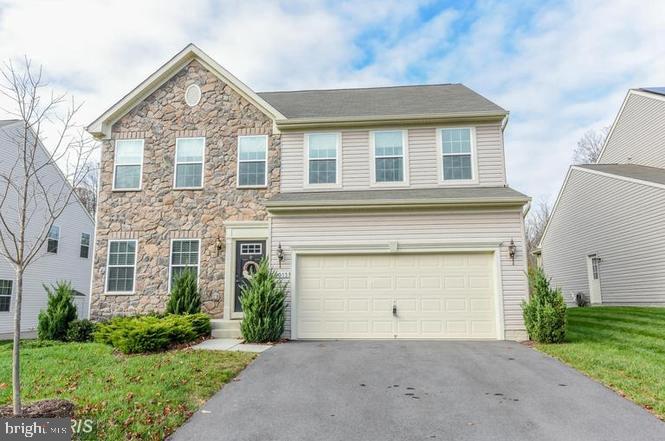 Nestled in the charming Claremont Overlook community (cul-de-sac), this stunning Colonial home offers a perfect blend of comfort and modern living. Built in 2012, the exterior features a tasteful combination of vinyl siding and stone, complemented by a well-maintained gutter system and a recent updated roof deck looking into the trees. Inside, enjoy the warmth of a gas fireplace and the convenience of energy-efficient high end stainless steel appliances in the updated farmhouse kitchen. With five bedrooms and three and a half bathrooms, this home is designed for both entertaining and everyday living. The fully finished basement adds valuable space for recreation or relaxation. Step outside to enjoy serene views of the surrounding trees and woods, creating a peaceful retreat. The neighborhood boasts excellent schools, nearby parks, and convenient public services, making it an ideal place to call home. With easy access to transportation options, including a commuter rail station just a few miles away, this property truly offers the best of suburban living.