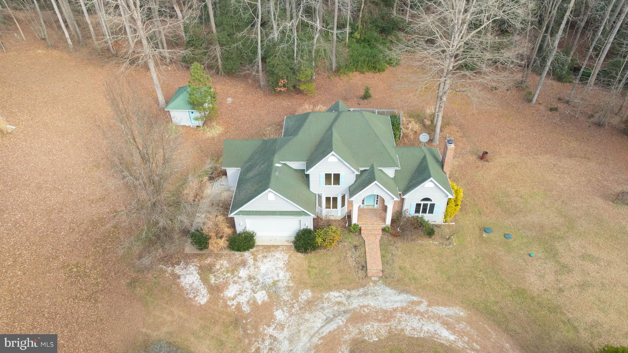 Seller says bring Offers!  Welcome home to your 13-acre personal estate with private road centrally located in Sussex County.  Offering a 4 bedroom, 3.5 bath, 2 car garage, with room to grow and make it your own.  Living area is located off the kitchen and offers lvp flooring, fireplace, and vaulted ceiling.  The kitchen offers an island with plenty of cabinet space and a eat in area with a slider to the rear deck.  Formal dining area just off the kitchen provides additional area for entertaining.  First floor owner's suite with separate access is tucked away from all the living areas.  Second floor offers 3 additional guest bedrooms and 2 baths.  Limited restrictions allow you to make it your own.  Don't let this opportunity slip away.
