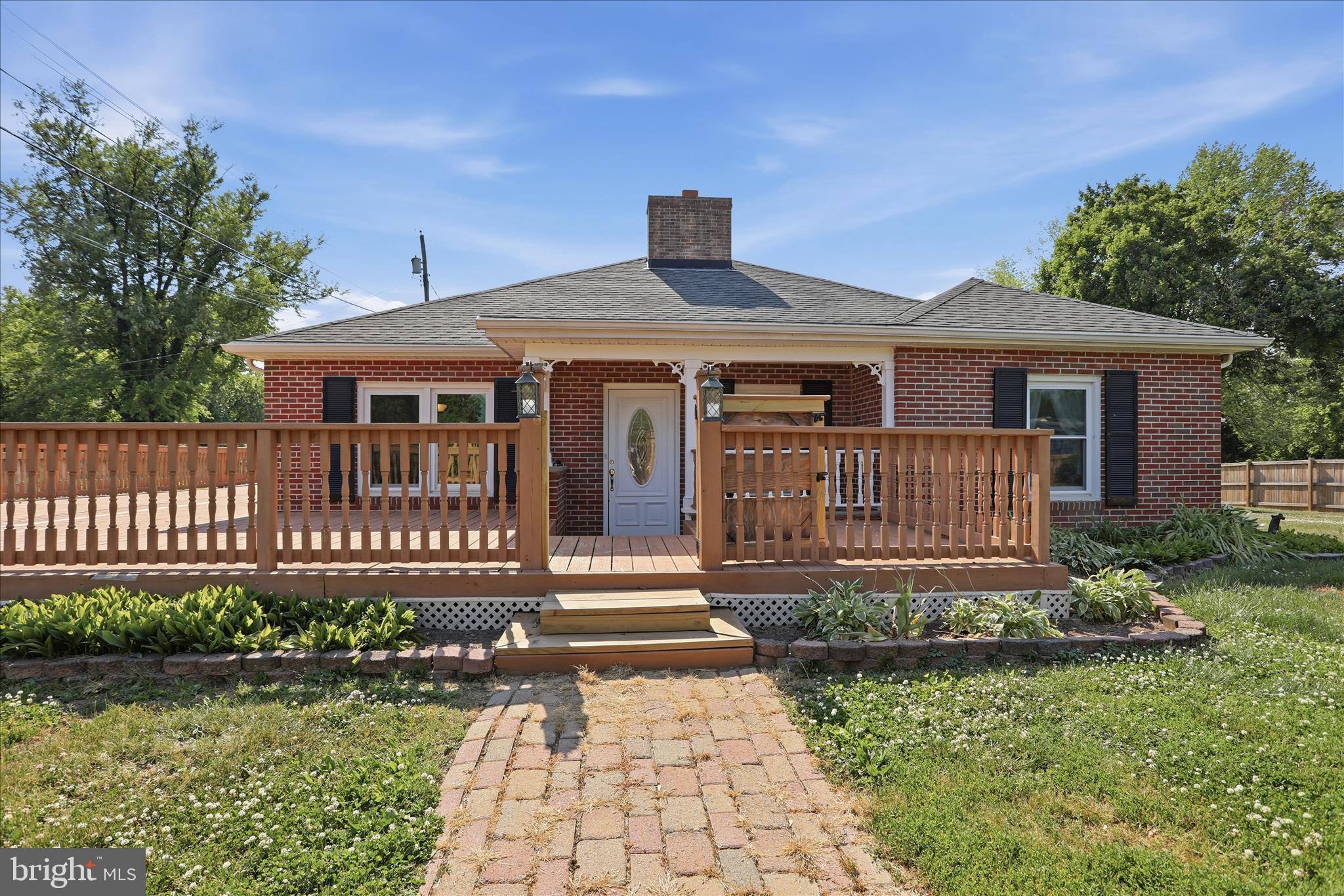 Spacious, one-of-a-kind property offering over 4,000 finished sq ft on a rare double lot in Charles Town! This 7 bedroom, 5 full bathroom home combines space, flexibility, and functionality with a layout ideal for multi-generational living, large households, or anyone needing room to spread out. The original home was fully renovated in 2000/2001 with additional expansions completed in 2009 and 2013. Features include an in-ground saltwater pool, fenced front and rear yards, privacy fencing in the backyard, garden shed, and multiple outdoor entertaining areas. Inside, the home offers oversized living spaces, a spacious primary suite, and a versatile floor plan with mostly one-level living plus an additional upper-level suite. Major system  include 3 HVAC systems, dual heating options with heat pump and oil/hot water backup heat for added efficiency and comfort during colder months, plus updated roof sections corresponding with the additions. No HOA and county location provide added flexibility while still being conveniently located near shopping, dining, commuter routes, and downtown Charles Town. A truly unique opportunity with space, versatility, and features rarely found in one property.