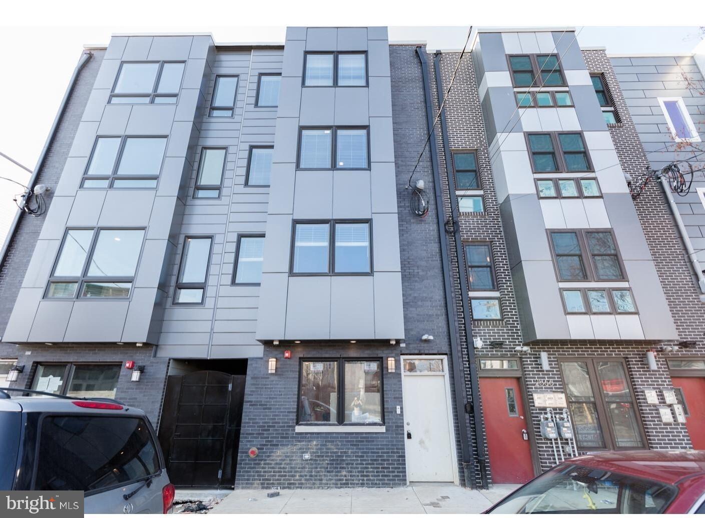 Beautiful and modern 2bed/2bath bi-level apartment located along the highly desirable Frankford Avenue arts corridor in East Kensington. This building has a secure entrance and is located close to Forin Cafe, Philadelphia Brewing company,  and close to the subway stop.  The first floor boasts an open floor plan with tons of natural light, hardwood floors,  fireplace and a combined living and kitchen space.  The gorgeous kitchen features stainless steel appliances, quartz counter tops and a wrap around counter providing extra work and sitting space.  On the second floor you will find 2 large bedrooms each with their own en-suite full bathrooms, and large closets as well as washer and dryer.  You will have access to two large shared roof decks to enjoy the sunsets and views of center city.  Tenant responsible to pay $75 toward building water, pets on a case by case basis, easy application process.