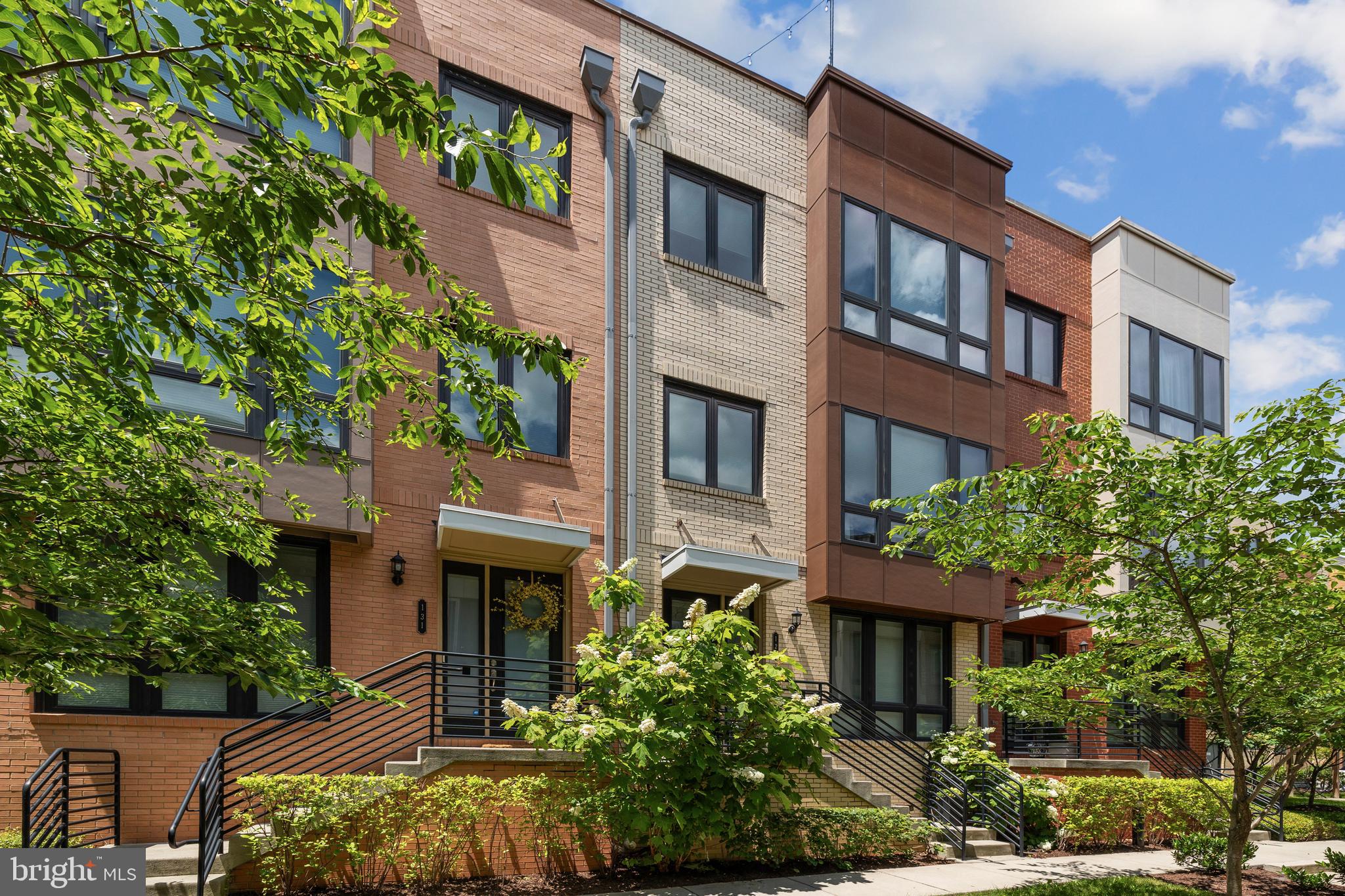 Closed Effectively for $910,000 sold to unrepresented buyer. Discover this stunning Pulte-built, 4-level townhome in the highly sought-after Cambria Square community! Offering 4 bedrooms, 3 full baths, 2 half baths, and a 2-car garage, this home is a true gem.
The main level features an open-concept floor plan with engineered hardwood floors, soaring 10-foot ceilings, and expansive windows that flood the space with natural light. The spacious living and dining areas flow seamlessly into the kitchen equipped with Whirlpool stainless steel appliances, including gas stove with double ovens and microwave. . Granite countertops, a custom backsplash, and a large center island complete the space, making it perfect for cooking and entertaining.
The upper level boasts a luxurious primary suite with a walk-in closet and upgraded bath featuring dual vanities. Two additional bedrooms, a full hallway bath, and a convenient laundry room complete the third level, with matching hardwood flooring in the hallway.
The fourth level is ideal for guests or entertaining. It includes a bedroom with a full bath, a cozy family room area with a wet bar and wine cooler, and access to a rooftop terrace featuring a gas fireplace—perfect for watching sunsets.
The lower level offers flexibility with an enclosed office, a half bath, and direct access to the 2-car garage. Additional features include oak staircases with iron balusters, dual-zone HVAC, and numerous upgrades such as custom accent walls and designer light fixtures.
Lawn care and exterior maintenance are covered by the condo association. Enjoy a convenient location with walking paths to Ben Brenman Park and easy access to Van Dorn Metro Station, shopping, dining, I-395, I-495, Old Town Alexandria, DC, the Pentagon, and Arlington. Exciting news: the Landmark Mall site is set to transform into a new Inova hospital and a vibrant mixed-use town center!
Don't miss this exceptional opportunity!