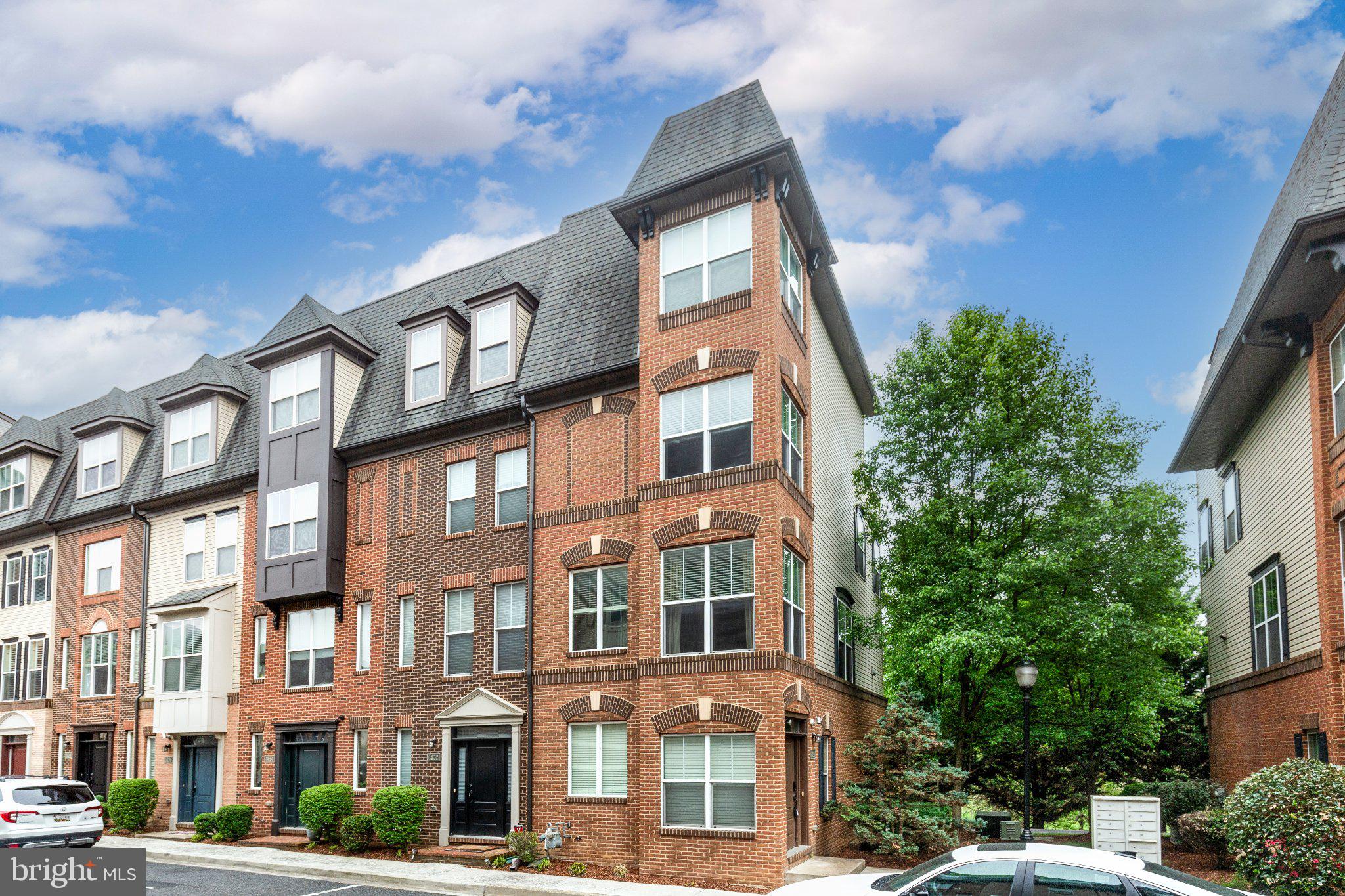 Welcome home to 1430 Trafalgar Court, a stunning four-level end unit townhome in the highly sought-after Monocacy South community. At just over 2,000 sq. ft. of living space, this lovely home boasts the largest floorplan available in the neighborhood. 
The main level offers an oversized one-car garage, and a bonus room perfect for a home office. On the first floor, an open concept living/dining area flows seamlessly into a large kitchen equipped with modern white cabinets, quartz countertops, and a large island with room for seating. The sleek stainless steel appliances include a gas cooktop and double wall oven - truly a chef's delight! 
On the second floor you'll find two large bedrooms, a full bathroom with double vanity, and the conveniently located laundry area. The entire third floor is dedicated to the master suite - a sizeable bedroom, two walk-in closets, ensuite bathroom with soaking tub and walk-in shower, and a private balcony where you can relax and enjoy the sights and sounds of this charming neighborhood.