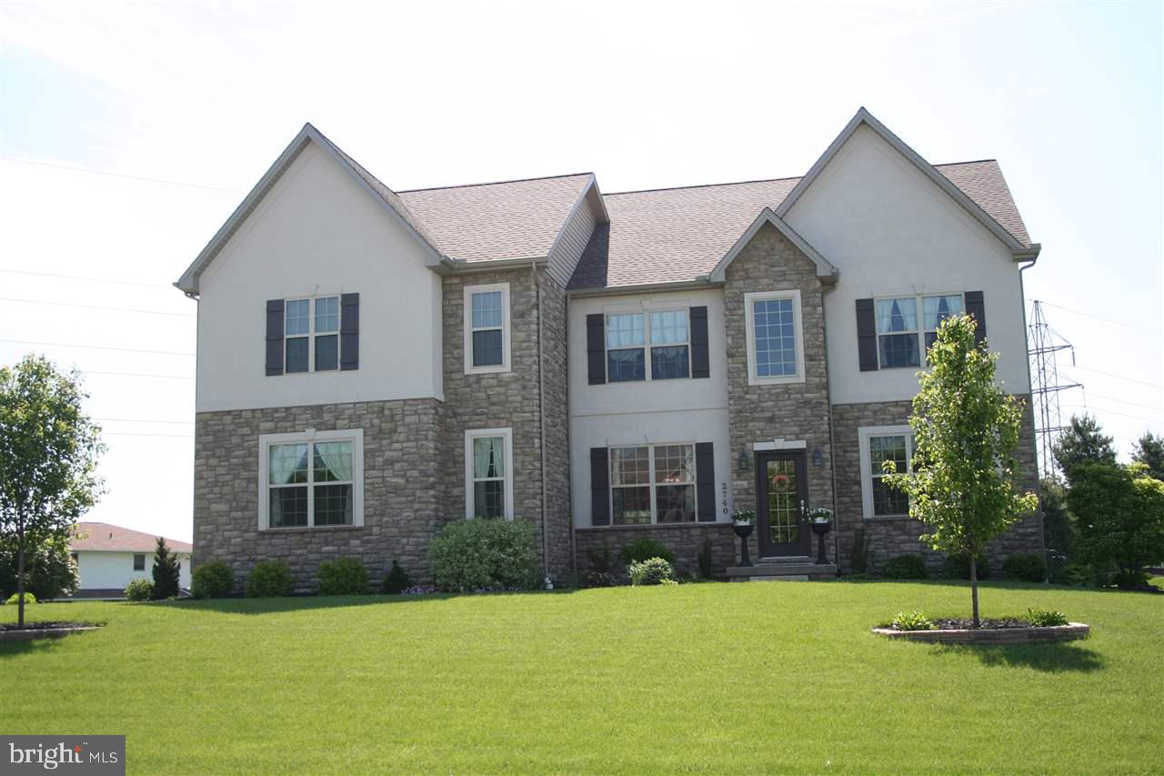 Welcome Home to this like new stately colonial perfectly situated in Hepplewhite Estates. Luxuriously appointed & meticulously maintained. Grand vaulted ceilings, custom gas fireplace, open, gorgeous kitchen perfect for entertaining. Spacious Master Suite w/clawfoot tub & large separate shower. Outdoor patio w/FP. Stunning finished basement w/wet bar & massive Theater Room. Must see this spectacular home!