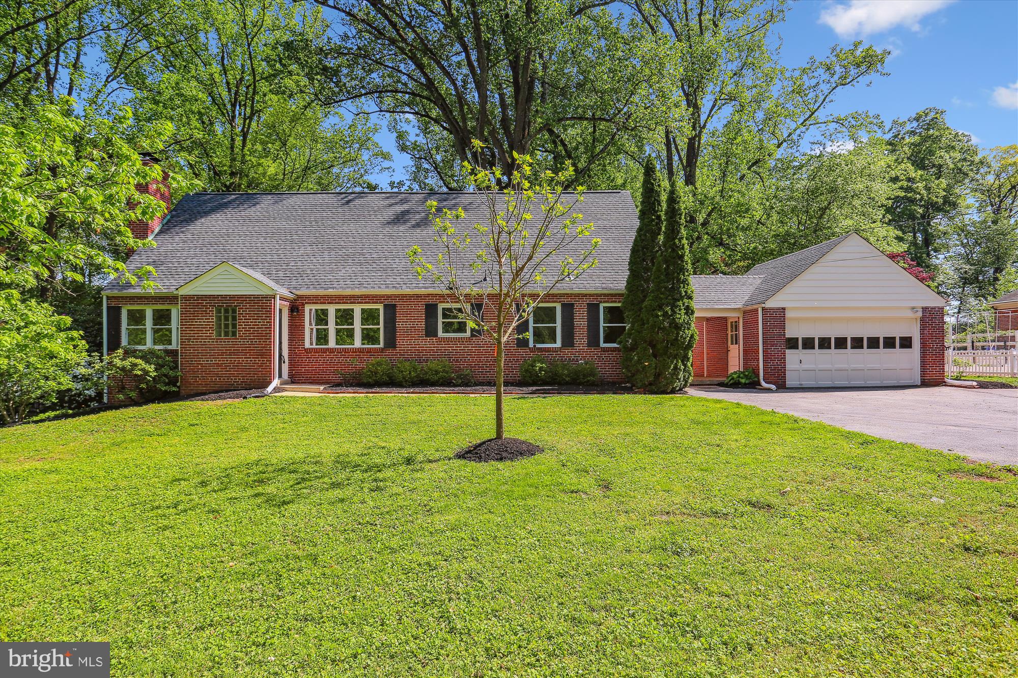 This stunningly updated Cape Cod home is nestled on a beautifully landscaped and private .87 acre fully fenced lot in a highly sought-after neighborhood. Boasting 5 spacious bedrooms and 4.5 bathrooms, this home offers exceptional versatility for today’s lifestyle.

Step inside to an open-concept floor plan with a seamlessly connected great room, living area, family room, and dining space—all centered around a cozy wood-burning fireplace. The renovated kitchen and bathrooms add modern flair, while thoughtful touches throughout blend comfort with elegance.

The finished basement is a standout feature, offering an efficiency apartment with full kitchen, full bath, recreation room, and exercise room—perfect for an in-law suite or au pair setup with its own private entrance, dedicated parking pad, and walkway. 
Additional highlights include a mudroom with main-level laundry hookup, secondary laundry area in the basement, and a newer roof for peace of mind.
Step outside and enjoy your own fruit-producing garden oasis, featuring cherry trees, raspberry, blackberry, and blueberry bushes, an apple tree, and grapevines. Gas connection as well as public sewer is available for future upgrades.

This home has it all—space, updates, privacy, and location. Don’t miss this rare opportunity!