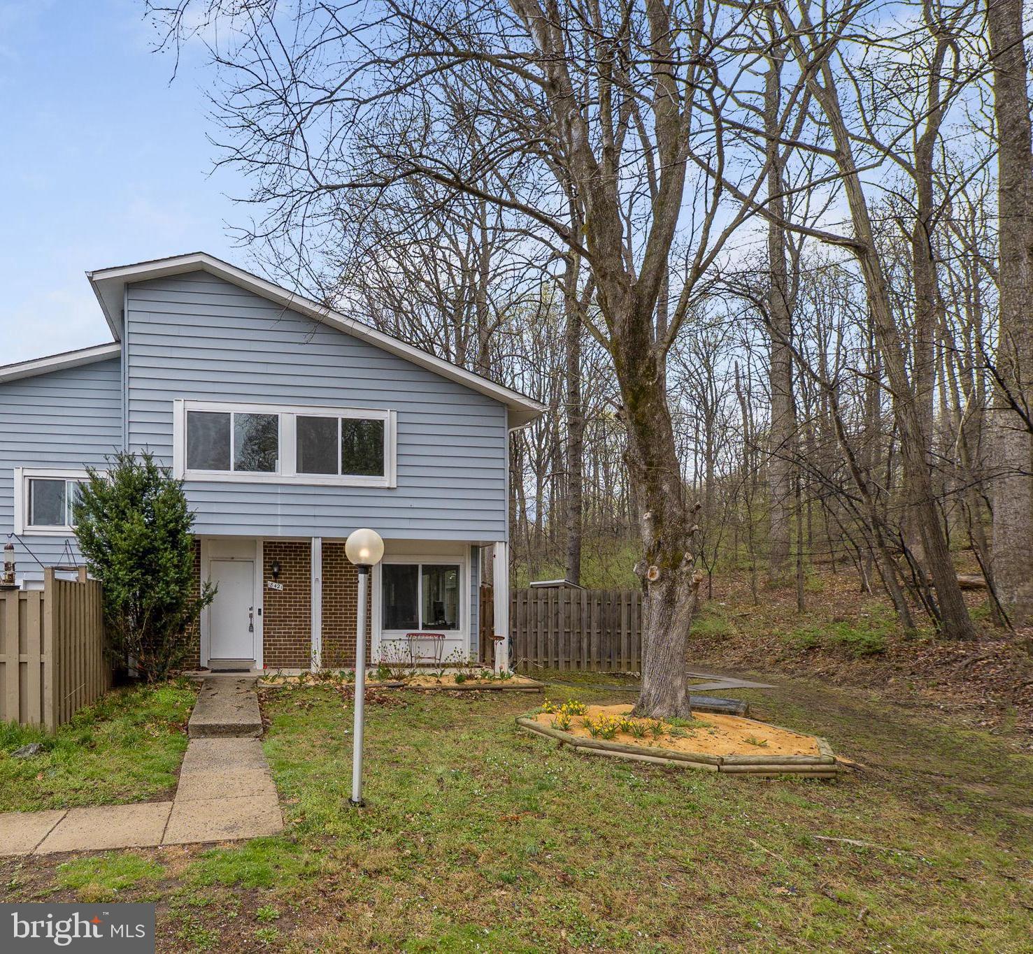 Welcome home to this beautifully updated townhouse in Germantown Park! Freshly painted with brand-new carpet throughout, this charming home is filled with natural light and offers a serene backdrop, as it backs to a lush tree line. Thoughtfully updated just five years ago, the home boasts a newer roof, windows, LED recessed lighting, HVAC system, hot water heater, and luxury vinyl plank flooring. The modern kitchen is a chef’s delight, featuring stylish cabinetry, gleaming granite countertops, and stainless steel appliances. With four spacious bedrooms and 2.5 baths, this home provides ample space for comfort and convenience. A private fenced patio offers the perfect outdoor retreat. Ideally located near commuter routes, shopping, dining, and entertainment, this home is a must-see!