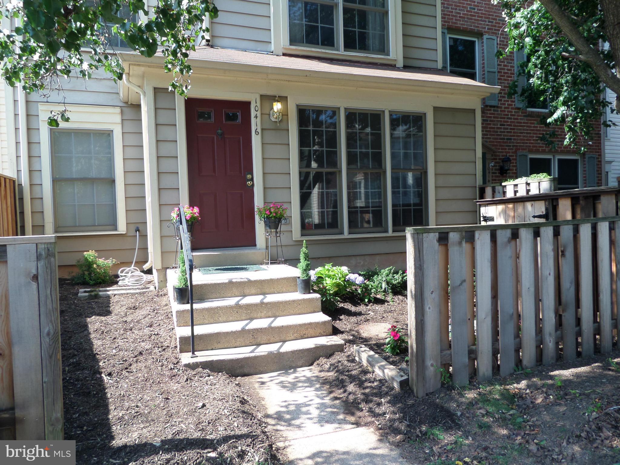 Every inch of this home has been updated, inside and out: Newly installed hardwood floors on the main level and stairs, granite counters, fresh landscaping. You will love the flexibility of this floor plan: Large, main level living/dining area with adjacent main level bedroom that can be a warm and inviting den with a fireplace. Full baths on each level. Large kitchen with table space.