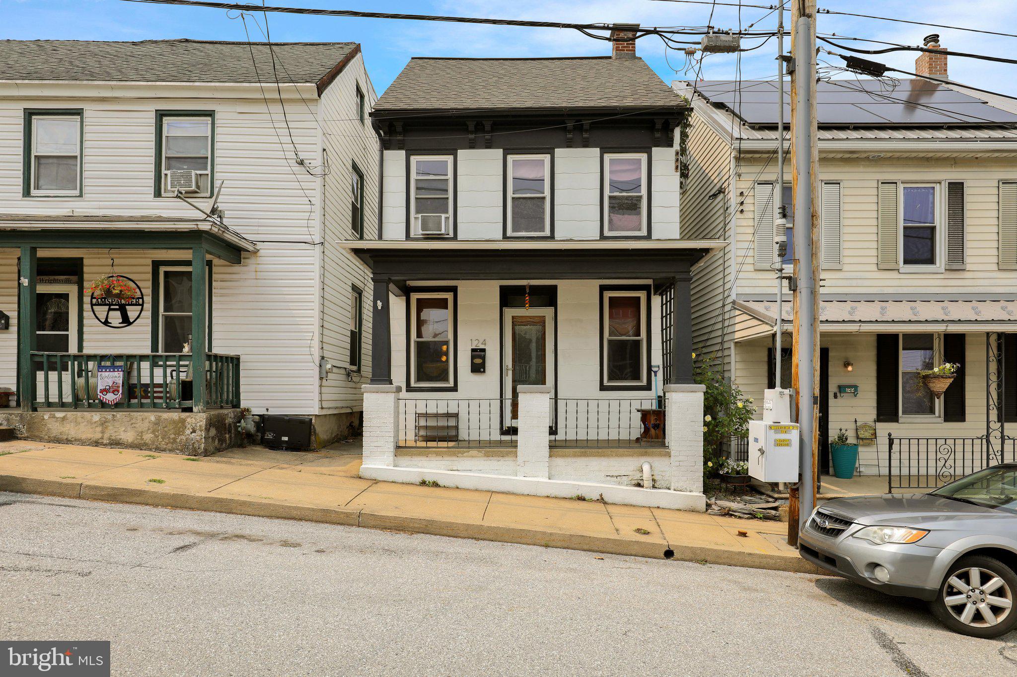 This recently updated 4-bedroom, 2-bath , 2000 sq ft+ home blends timeless character with modern upgrades. The kitchen features granite countertops, stainless steel appliances, a large island with seating on three sides, a walnut butcher block bar, and an abundance of cabinetry.
The exterior has been recently painted , replacement windows and newer roof for added peace of mind. Step outside to enjoy the fenced backyard complete with a pavilion and outdoor fireplace...perfect for cookouts and entertaining.  24 x 24 garage!
While thoughtfully updated, the home retains many of its original architectural details, including the grand staircase, built-in bookcase, original woodwork, and the craftsmanship that defines a solidly built early-1900s home.
Conveniently located with easy access to Routes 462 and 30, this home is within walking distance of the elementary school, local shops, restaurants, and Riverfront Park with its boat launch. Enjoy the beauty of the Susquehanna River just one block away, offering excellent opportunities for fishing, boating, and outdoor recreation.