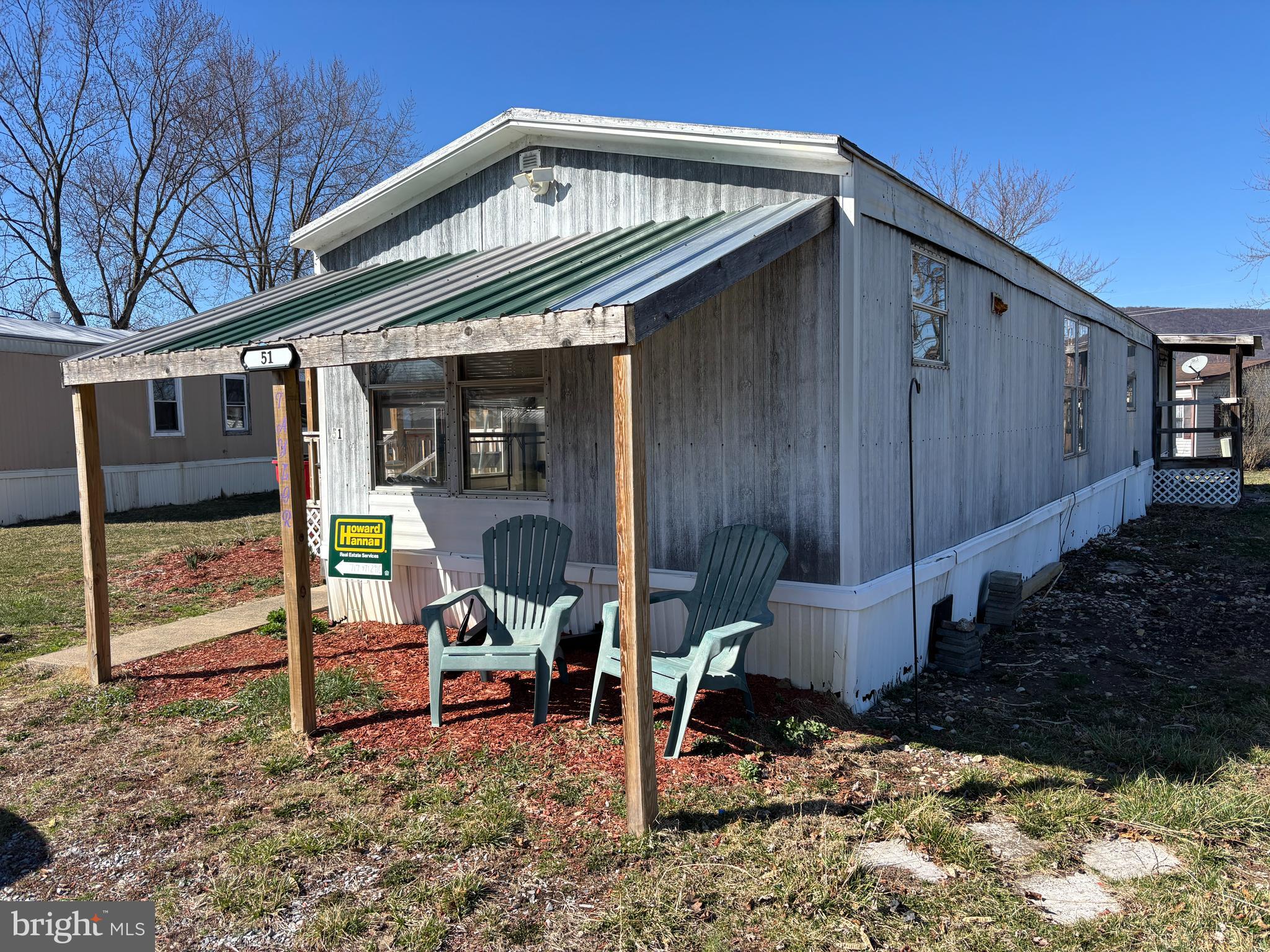 Discover this charming 2-bedroom, 1-bathroom manufactured home, ideally situated in a serene neighborhood. Built in 1984, this ranch-style residence offers a cozy and inviting atmosphere, perfect for those seeking comfort and convenience. With a total finished area of 938 sq. ft. , the layout maximizes space, featuring a blend of carpet and laminated flooring that enhances the home's warmth. The exterior boasts durable metal siding, ensuring low maintenance while providing a classic look. Enjoy the ease of off-street parking with space for two vehicles, making access to your home hassle-free. Although there is no pool, the property offers a blank canvas for outdoor enthusiasts to create their own private retreat. Located in a peaceful setting, this home is just a short drive from local amenities, shopping, and dining options, making it an ideal choice for those who appreciate both tranquility and accessibility. Whether you're looking to downsize or seeking a starter home, this property presents an excellent opportunity to embrace a comfortable lifestyle in a welcoming community. Don’t miss your chance to make this delightful home your own!