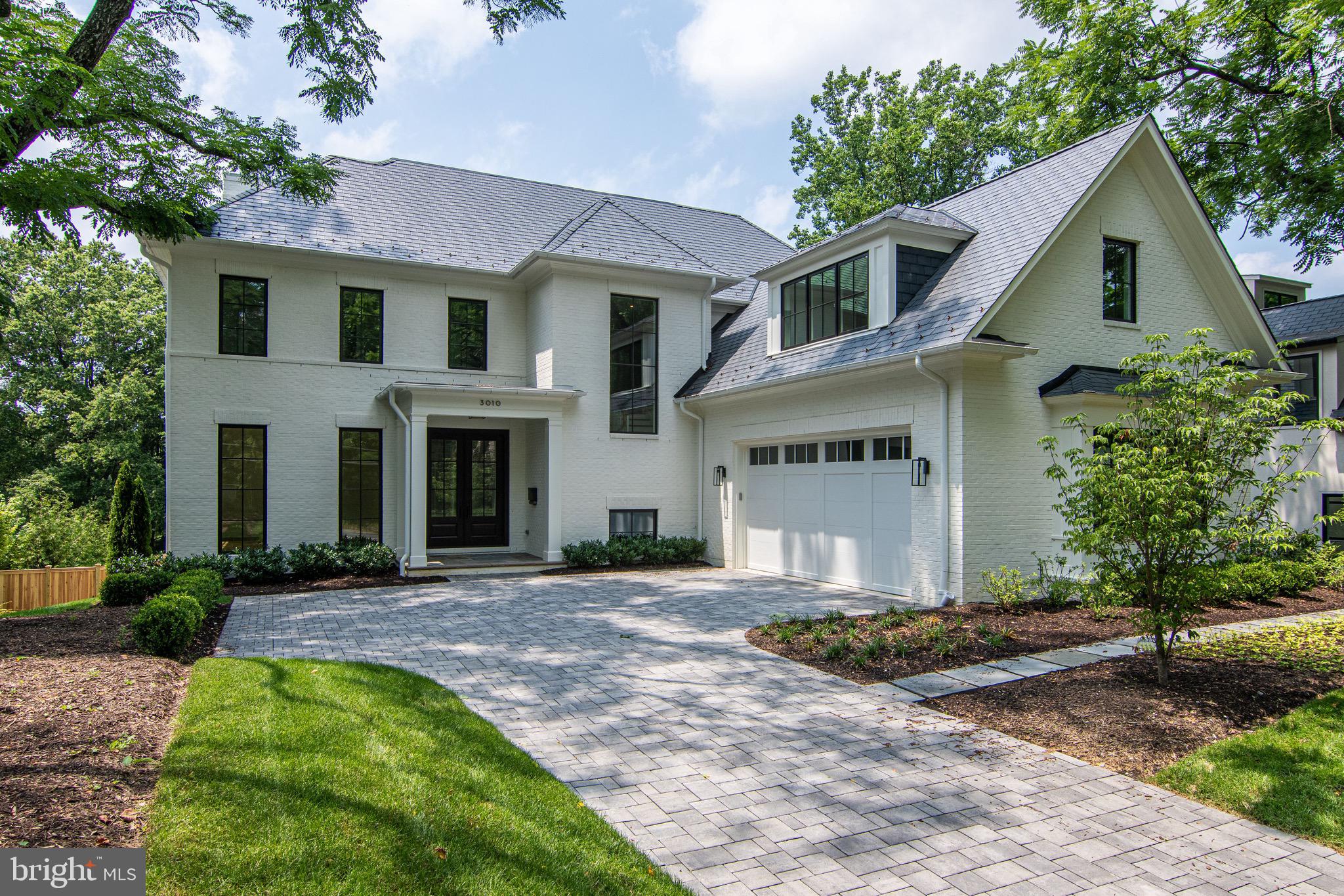THIS BRAND NEW SENSATIONAL PAINTED BRICK COLONIAL FEATURES A FABULOUS FLOOR PLAN WITH TRANSITIONAL ELEMENTS AND STYLE. JUST COMPLETED BY AWARD WINNING SANDY SPRING BUILDERS AND DESIGNED BY ACCLAIMED GTM ARCHITECTS, THIS FANTASTIC HOME HAS APPROXIMATELY 8000 FINISHED SQUARE FEET ON FOUR DELUXE LEVELS AND IS IDEAL FOR BOTH FULL SCALE ENTERTAINING AS WELL AS COMFORTABLE LIVING. COMBINING THE FINEST MATERIAL WITH EXPERT WORKMANSHIP, THIS HOME IS FOR THE MOST DISCERNING BUYERS.  FROM THE STUNNING GOURMET KITCHEN TO THE ADJOINING GREAT ROOM WITH BEAMED AND COFFERED CEILING TO THE FORMAL GATHERING AND DINING ROOMS, NO DETAIL HAS BEEN COMPROMISED IN PRESENTING THIS HOME OF DISTINCTION.   A CUSTOM ELEVATOR SERVICES ALL FOUR LEVELS INCLUDING THE UPPER TWO FLOORS ADORNED WITH FIVE BEDROOMS, FIVE BATHS, STUDIO AND EXQUISITE PRIMARY BEDROOM SUITE WITH LUXURY BATH, DRESSING ROOMS AND EXPANSIVE DECK.   FURTHER ENHANCING THE HOME'S APPEAL IS A FULLY FINISHED OUTDOOR ACCESS LOWER LEVEL COMPLETE WITH SECOND GATHERING ROOM, GAME ROOM, EXERCISE ROOM AND GUEST SUITE WITH PRIVATE BATH.  A GORGEOUS COLUMNED FLAGSTONE LOGGIA IS ACCESSED FROM THE MAIN LEVEL GATHERING ROOM AND OVERLOOKS A PREMIUM LOT WITH LEVEL POOL SIZED YARD FRAMED WITH MATURE TREES. IDEALLY LOCATED IN KENT, ONE OF WASHINGTON DC'S MOST DESIRABLE AND SOUGHT AFTER COMMUNITIES, THE HOME IS CONVENIENTLY LOCATED WITH ACCESS TO ALL OF DC'S FINEST PRIVATE SCHOOLS, GEORGETOWN, CAPITAL CRESCENT BIKE TRAIL AND TWO MAJOR AIRPORTS.