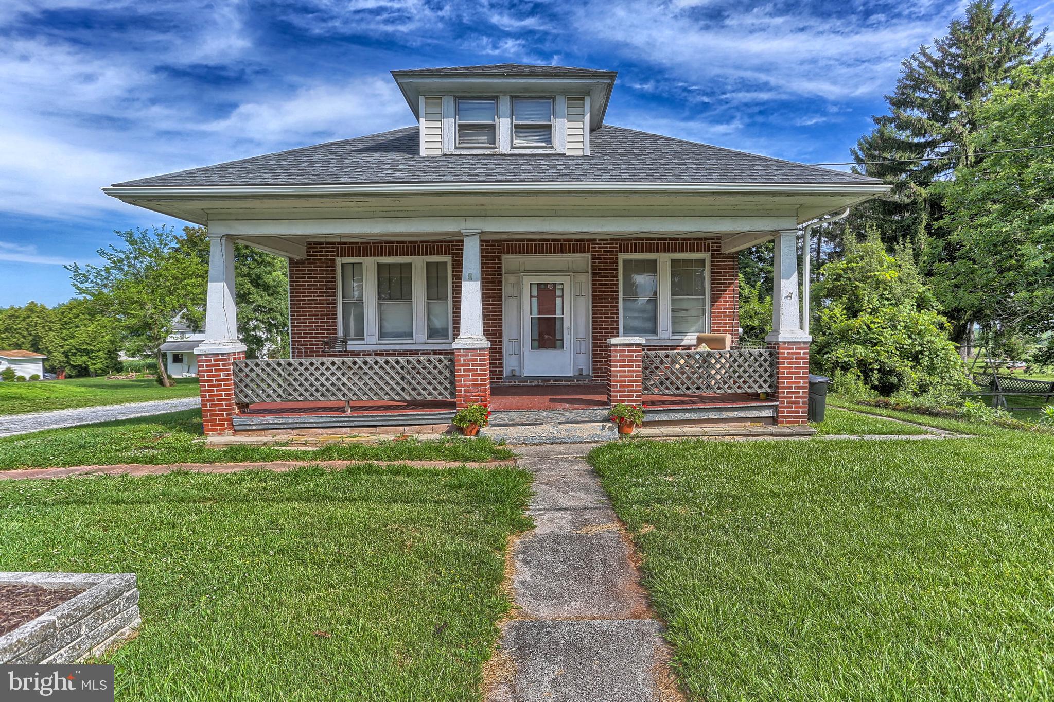 Solid brick home in a great location * Home has great bones and beautiful character * With some TLC this home will shine again *  Large rooms with  natural woodwork and hardwood floors * Separate dining room with beautiful wood & glass pocket doors separate the living room * Remodeled kitchen, wood cabinets, corian counter tops & ceramic back splash * Spacious first floor laundry room with laundry sink and cabinets * Mud room at the back of the house * Two bedrooms and full bath on the first floor * The second floor has potential to house an awesome owner's suite with a full bath, bedroom and walk-thru bonus room * Unfinished storage room on the second floor * Spacious basement with potential to finish * Live in this beauty & gain quick sweat equity * Investors welcome * New roof in 2017 * Waterproofing system  *