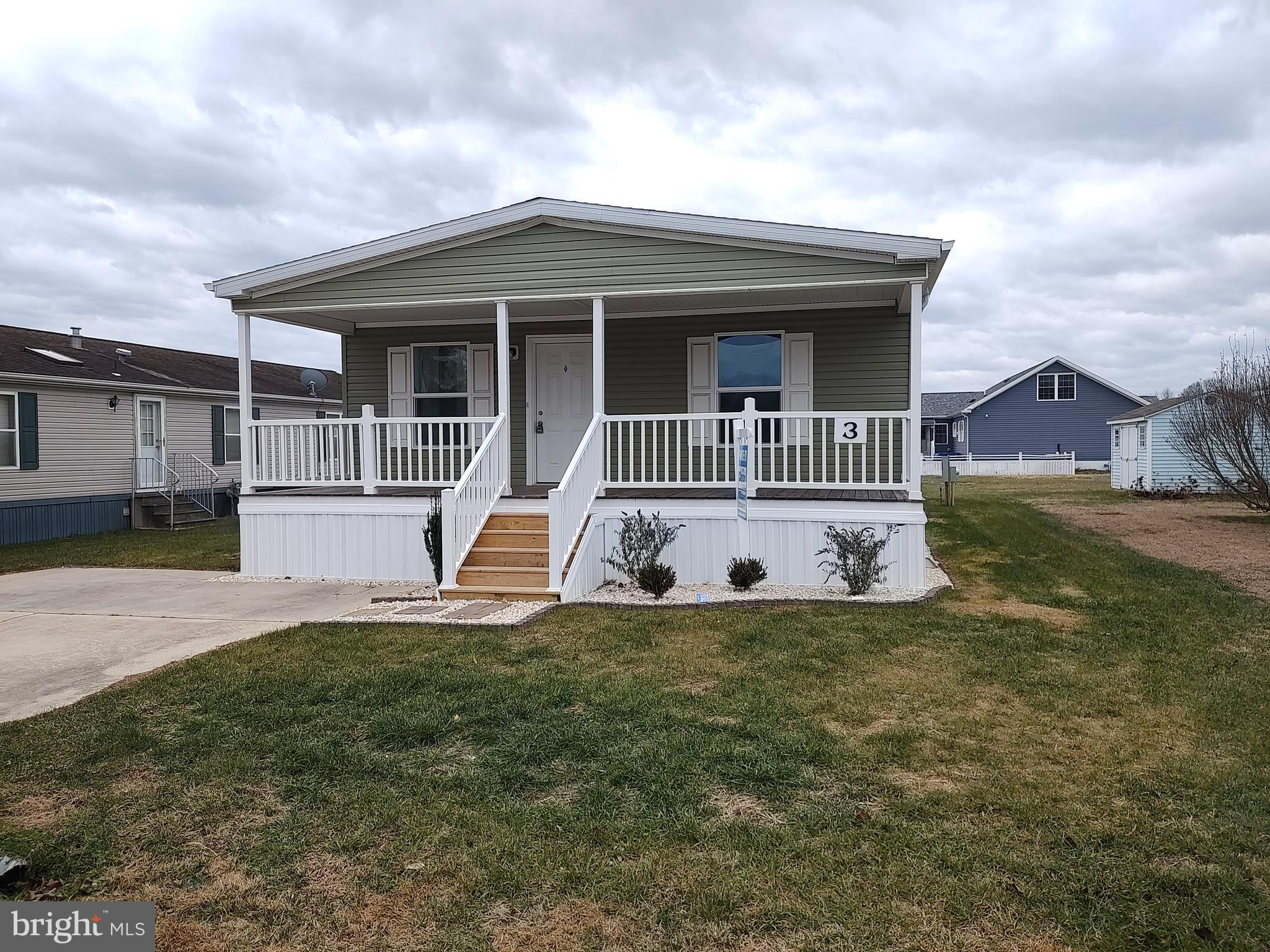 Brand new 3 bedroom 2 bath home with painted drywall throughout. The home is located in the highly desirable community of Sussex East and just minutes to the beaches of Lewes DE and Rehoboth Beach DE. Also you're minutes to all the shopping outlets, restaurants and nightclubs in the area. Walking up to the home is an 8' covered deck to set out and enjoy the beautiful summer weather. The home also features an open floor plan that has been professionally decorated with furniture and decor that's included with the home. The kitchen is equipped with a stainless steel appliance package with white cabinets and a separate dining room for family dinners. The master bath has a walk-in shower and a tub/shower in the second bath. The flooring is vinyl  for easy maintenance. Schedule your showing and come see all this home has to offer!