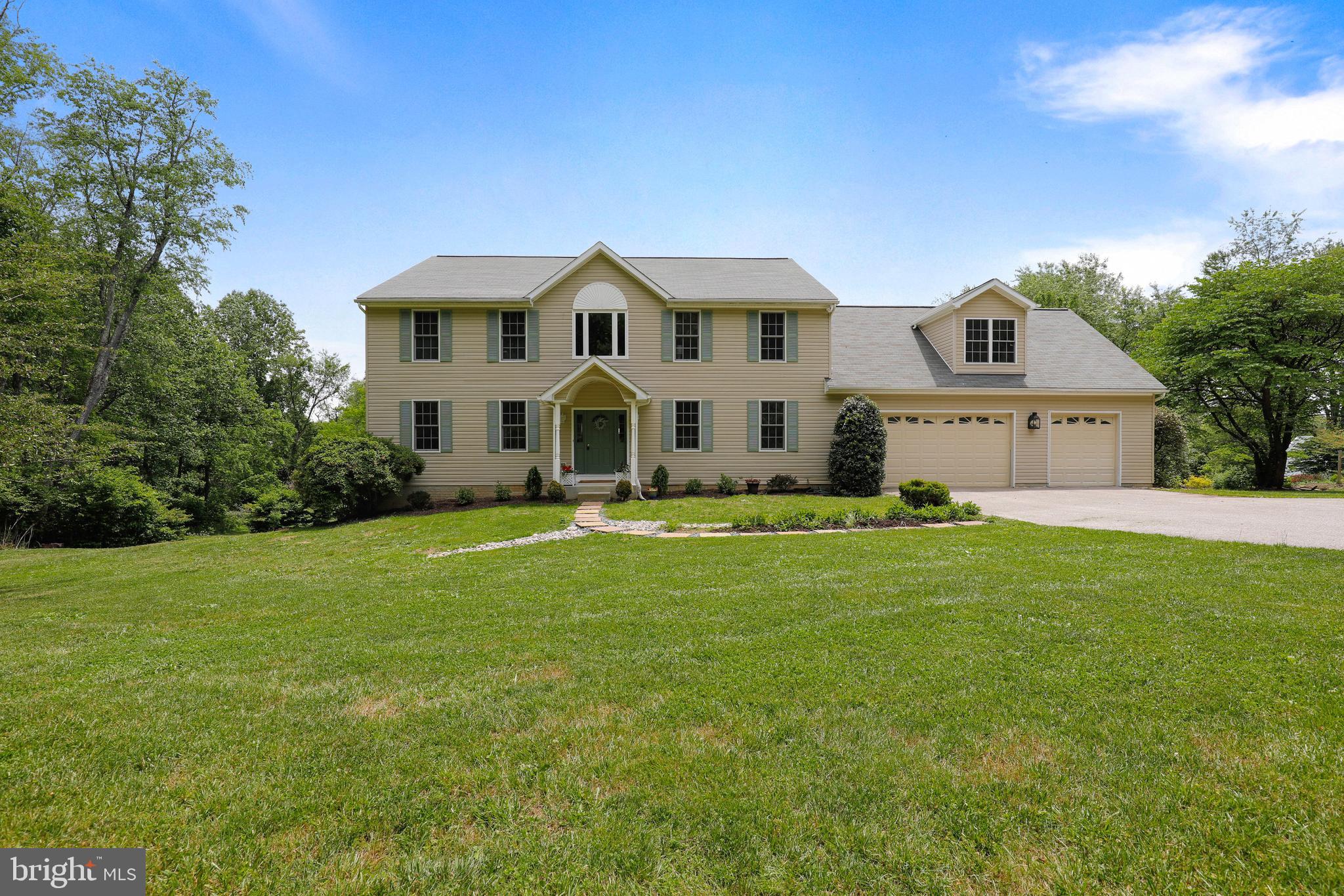 Tremendous opportunity to live on a very private 5 acre homesite in beautiful Dayton MD. Your home is perfectly sited on the land to optimize the open areas while being surrounded by mature landscaping and a wall of greenery.    Every spring and fall your young orchard will begin producing a variety of peaches, apples and pears. Enjoy planting and harvesting in your fenced in garden knowing the deer and rabbits won’t sneak a nibble. Walk over to the small barn perfect for boarding horses and storing hay in the loft, rebuilding historic cars, or just store some of your larger landscaping equipment.  All summer long you can escape the heat with a refreshing swim in your pool.      Built in 2006, your home offers nearly 4000 sq feet above ground with another 2000 partially below grade giving amazing options with a walkout basement. The expansive 3 car garage offers a storage loft above and feeds directly into your house via an amazing laundry and mudroom area complete with built-ins for boots and coats. 4 oversized upstairs bedrooms feature 1 private ensuite and 1 jack and jill style bathroom. The owner suite overlooks the backyard and offers a stand alone soaking tub and dual walk in closets.  The main level was just refreshed with a heavenly shade of gray to match the brand new flooring throughout. The kitchen is perfect to entertain guests all year round. During the holidays, guests can spread out in the formal dining or living rooms, hide in the study or warm themselves around the wood burning fireplace. Of course, for game days you might have to usher them away from the full bar in the basement. This home offers so much. Don’t miss this opportunity.     Your home is perfectly sited on the land to optimize the open areas while being surrounded by mature landscaping and a wall of greenery. You’ll forget you have a small stream running along the lower valley as your guests are sitting high on the balcony overlooking the beautiful space. Campfires and storytelling will be commonplace around the amazing fire pit area.      Built in 2006, your home offers nearly 4000 sq feet above ground with another 2000 partially below grade giving amazing options with a walkout basement. 4 oversized upstairs bedrooms feature 2 private ensuites and 1 jack and jill style bath. The storage space above the 3 car garage could make spectacular 5th upper bedroom or double the expanse of the owner suite. The main level was just refreshed with a heavenly shade of gray that you’re sure to love to match the brand new flooring. The kitchen is perfect to entertain guests all year round. During the holidays, guests can spread out in the formal dining or living rooms, hide in the study or warm themselves around the wood burning fireplace. Of course, for game days you might have to usher them away from the full bar in the basement.