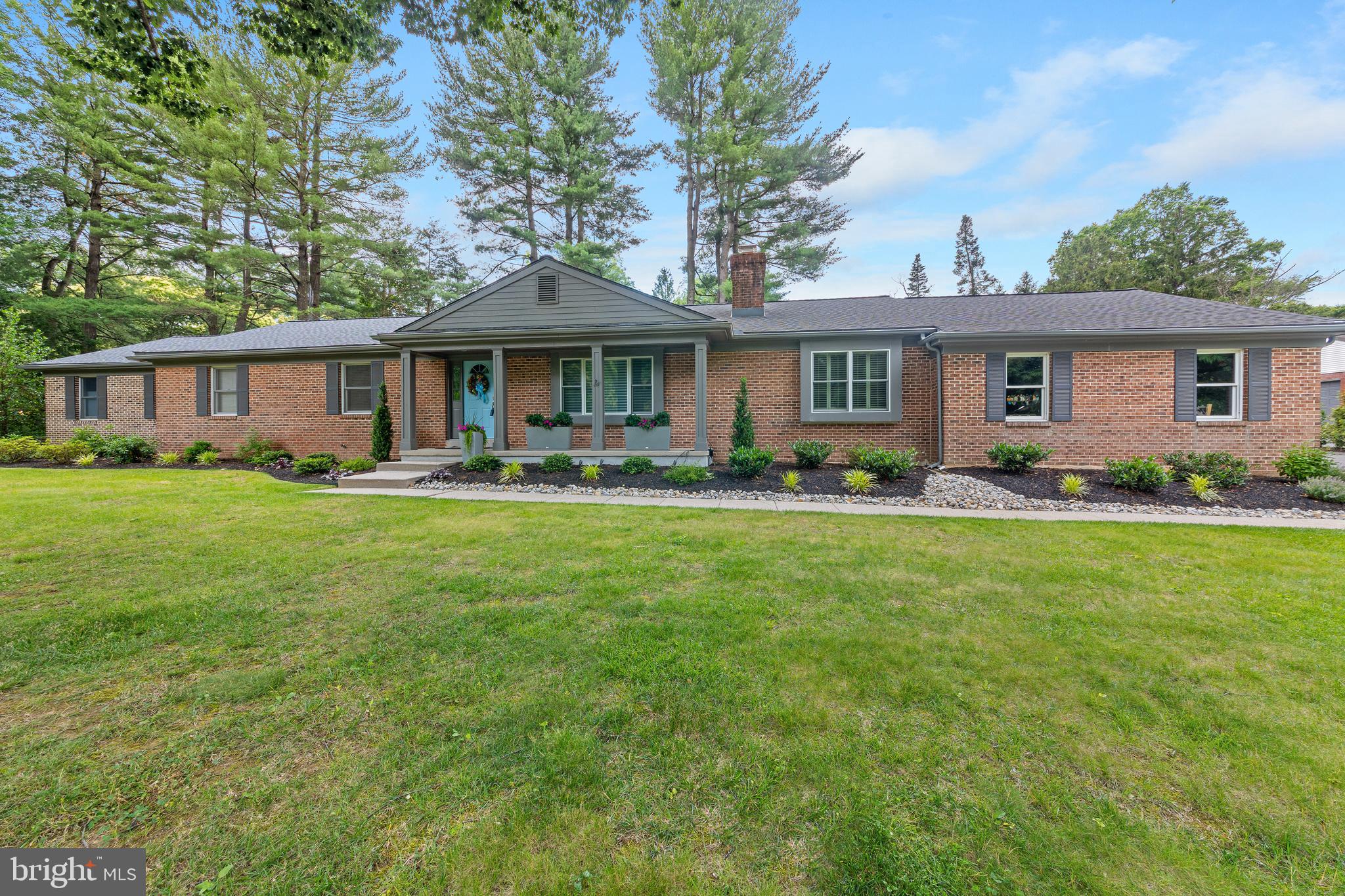 Located near the Delaware river and a quaint, historic village, this immaculately maintained and cared for home is a special find. From the moment you step inside this appealing brick front ranch you will be impressed with its flowing floor plan, its calming decorator motif of colors, trims, treatments. This extraordinary home is unquestionably in truly move-in condition. Sophisticated gourmets who love to home entertain will be captured by its living room with room brightening bay window and mercer tile accented fireplace. The dining room, has a bay window, elegant wainscoting, built-in curio cabinet and crystal chandelier. The updated, stylish kitchen is a standout showcasing a center granite island with beverage sink, tiled backsplash, buffet counter for serving, coffee station, beverage cooler and premium Bosch appliances. With under cabinet lighting setting the mood, you won't find anything lacking for hosting and entertaining family and friends. Equally, both you and your guests, will enjoy relaxing in the comfortable, inviting family room and in warmer weather, you can transition to the attached breezy, enclosed screened patio which leads to the outdoor paver patio with its tranquil view of the nature-filled rear yard of mature, perennial plantings, flowering trees and shrubs with the soothing sound of a nearby water fountain for your added relaxation. The entire corner property is a retreat for outdoor enjoyment and relaxation that will delight you year-round. Plus, because of its fully fenced rear and lighted back yard, it’s the perfect place for your pets to roam and feel safe. Three bedrooms are very well-proportioned with recessed lighting with the peaceful primary offering a walk-in closet with organizer and a stunning ensuite bath with double vanity of beautiful vessel sinks and tiled walk-in shower . As part of the thoughtfully designed addition, this home offers a versatile bonus room which can serve as a study, office or flex space, also with recessed lighting, ideal for those who work from home. There is no doubt this home will appeal to the most discriminating homebuyer. Other special features of note include: new roof, and leaf filter gutter guards, new HVAC, rear fence extensions, new carpeting, tasteful lighting upgrades, new high quality window blinds, new kitchen appliances and rear door, new tile flooring and blinds in screened patio. Additional highlights are a full basement , oversized garage and new landscaping.  Included are Coleman storage cabinets and work tables that will provide all the storage and workable space you could ever need. Plus, a natural gas-powered whole house generator lends added peace of mind. This rare to find home adjacent to the bucolic canal towpath represents all you would want, need and been looking for in easy, one floor living in a picturesque, idyllic Bucks County setting. Don't delay, schedule your personal tour today!